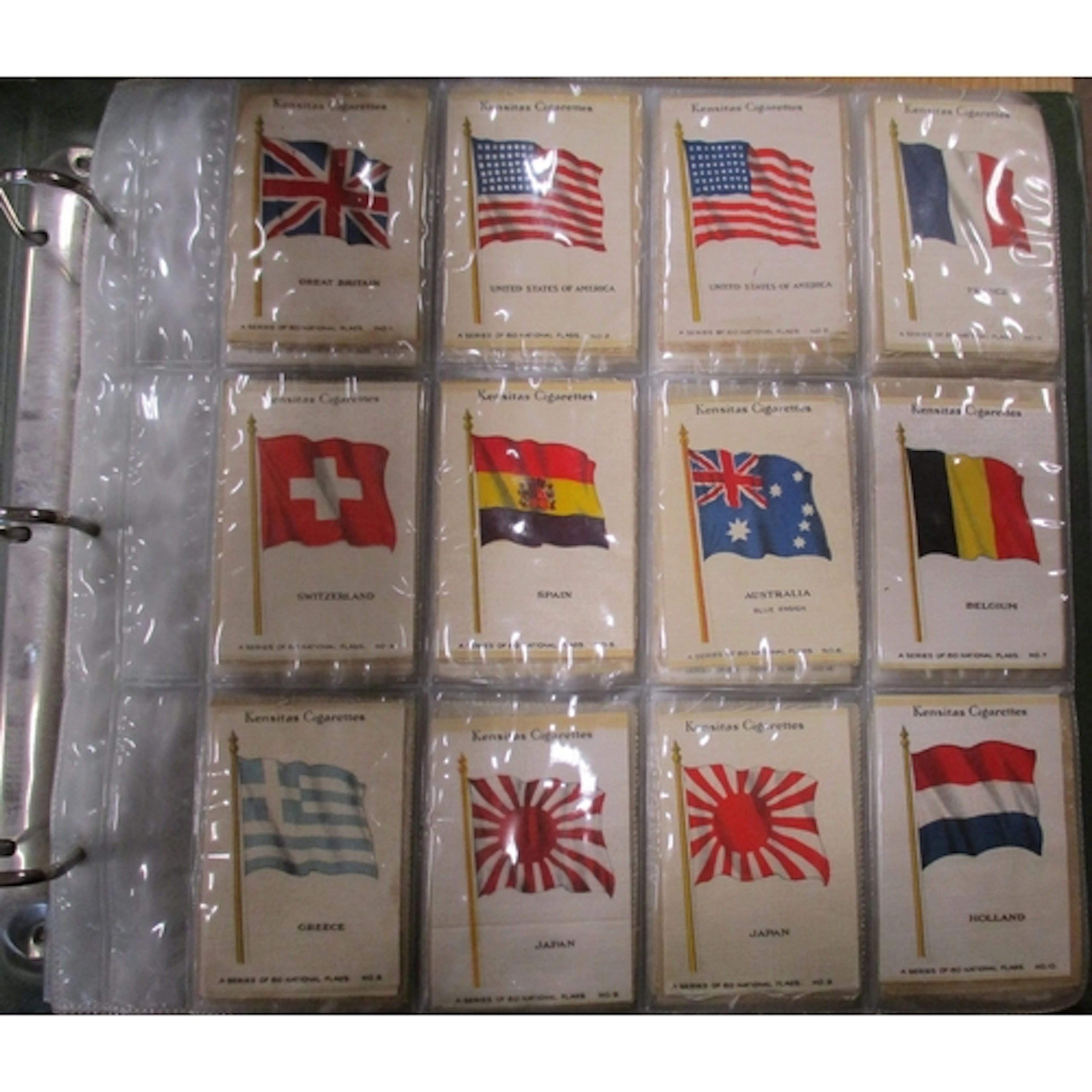 Collection of silk flags in 4 albums including complete sets...