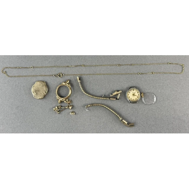 Jewellery: a 9ct gold ladies watch case, a necklace and earr...