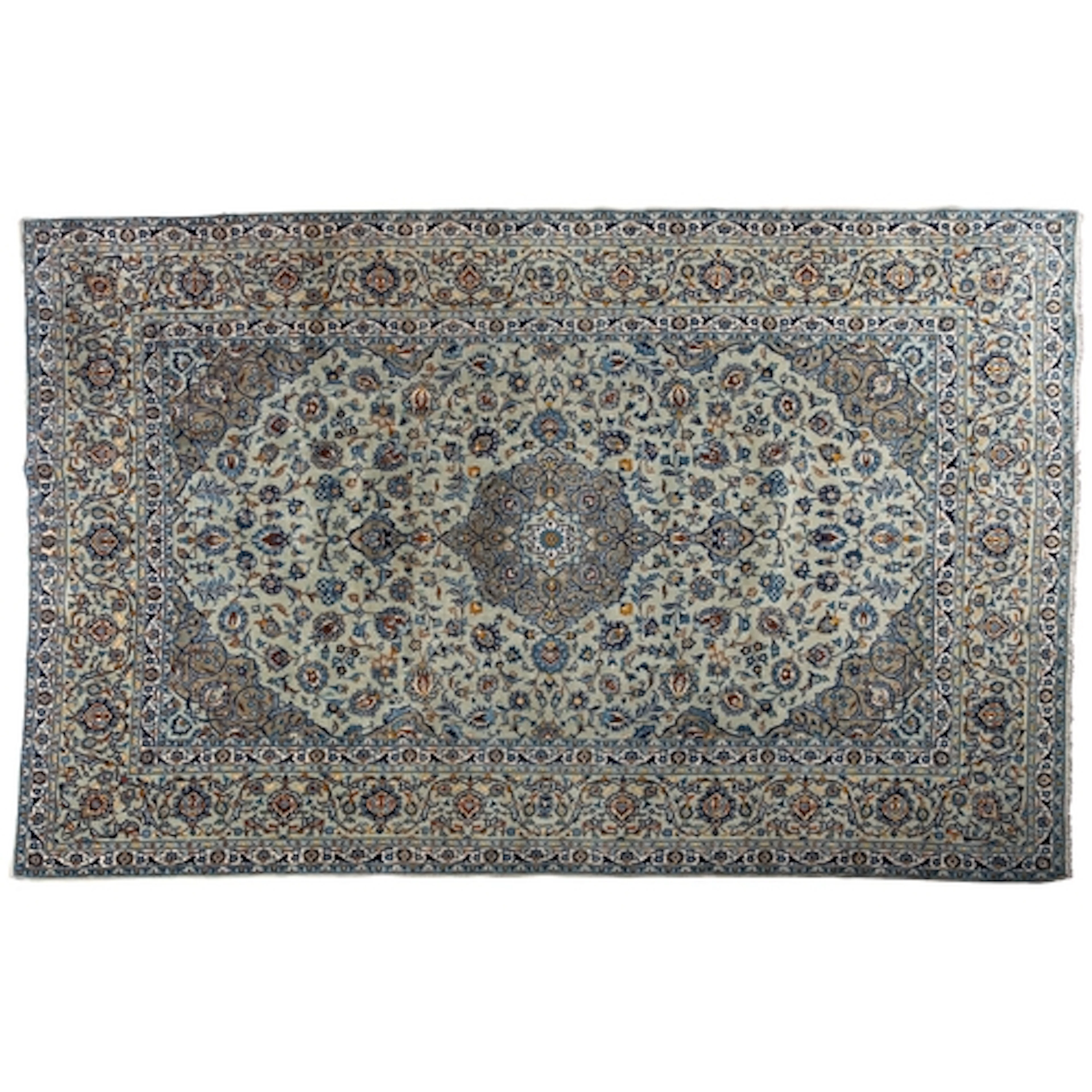 A Kashan carpet, the pastel blue cartouche field with a cent...