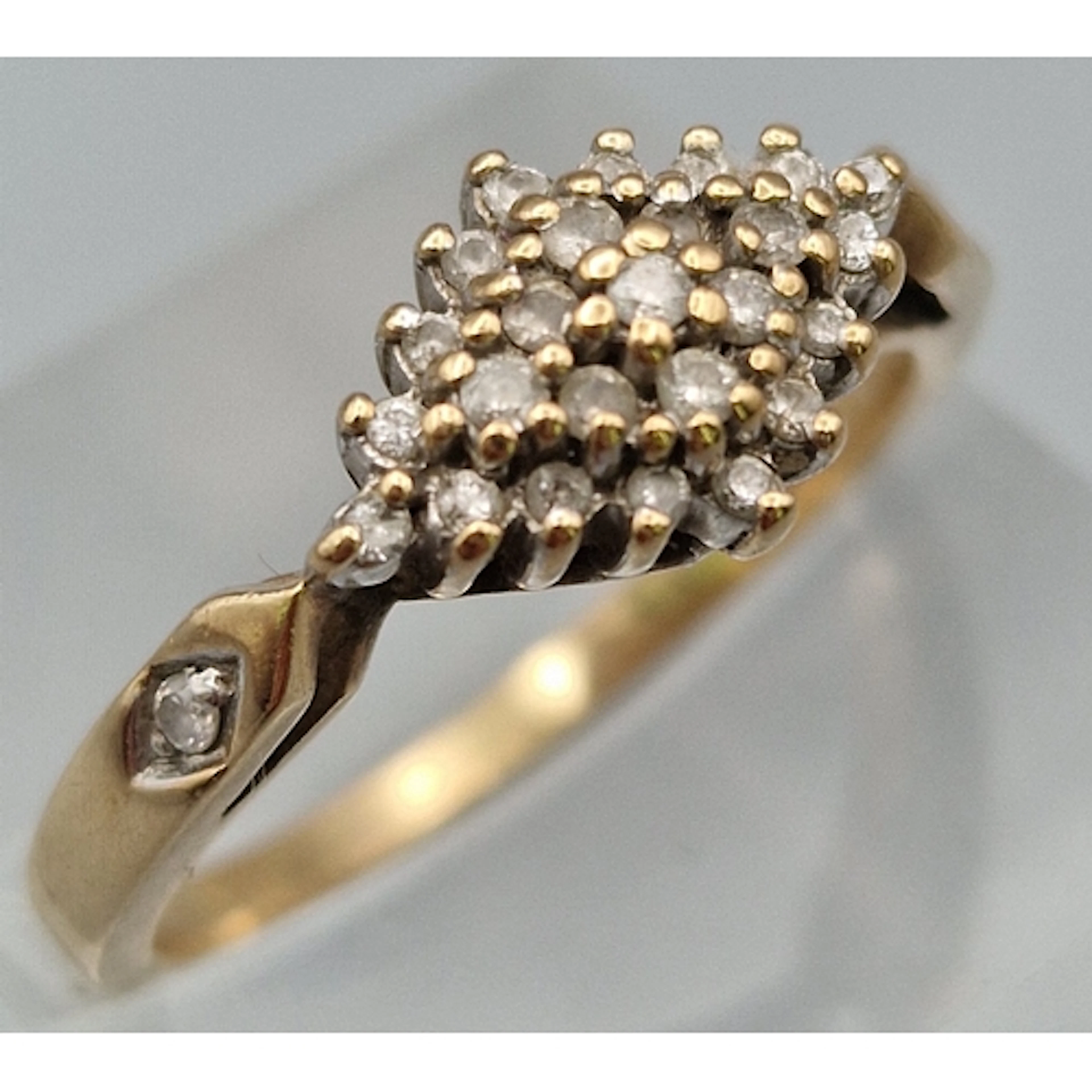 9ct gold Navette style diamond cluster ring. 2.9g approx. Si...