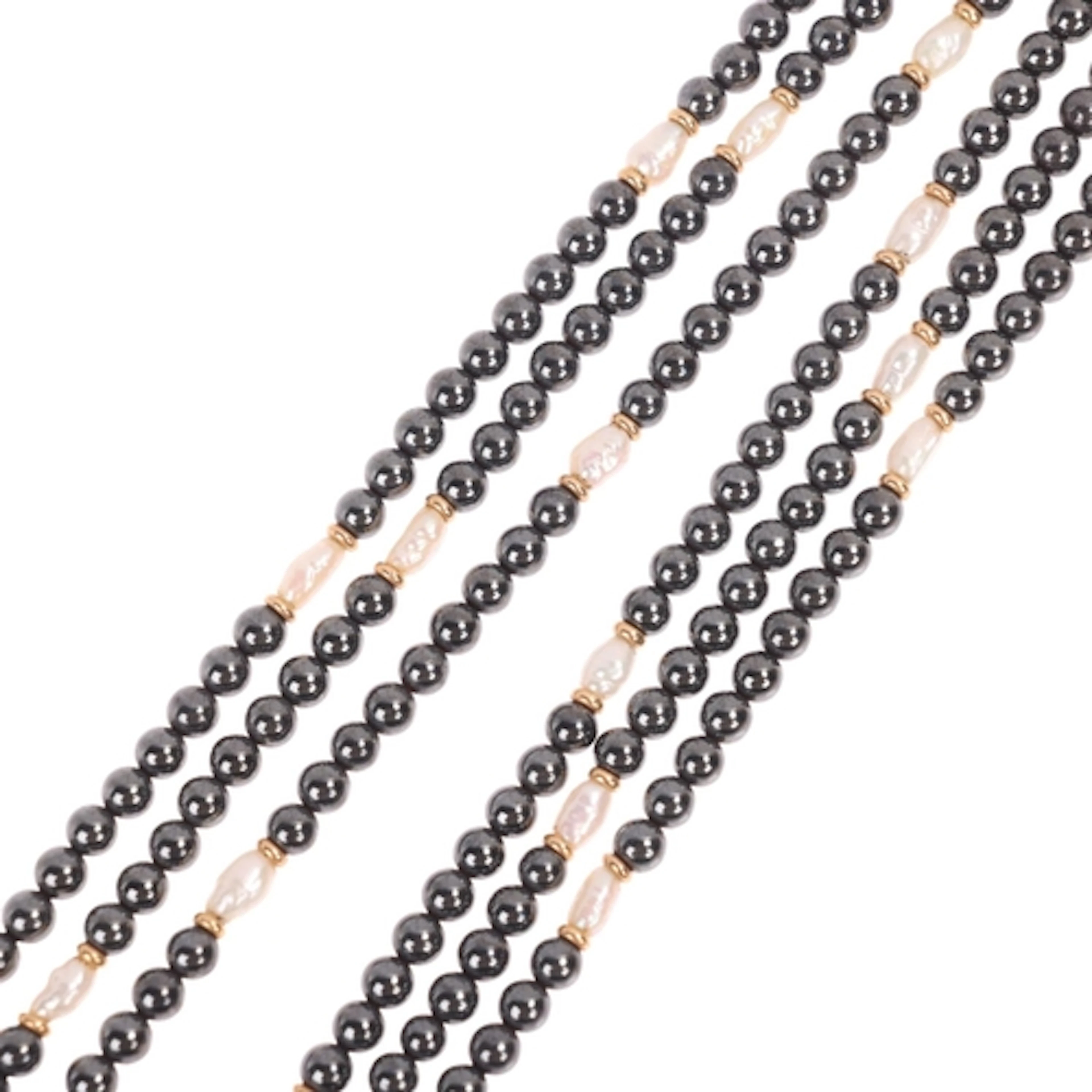 A Vintage triple-row pearl and hematite bead necklace, with ...