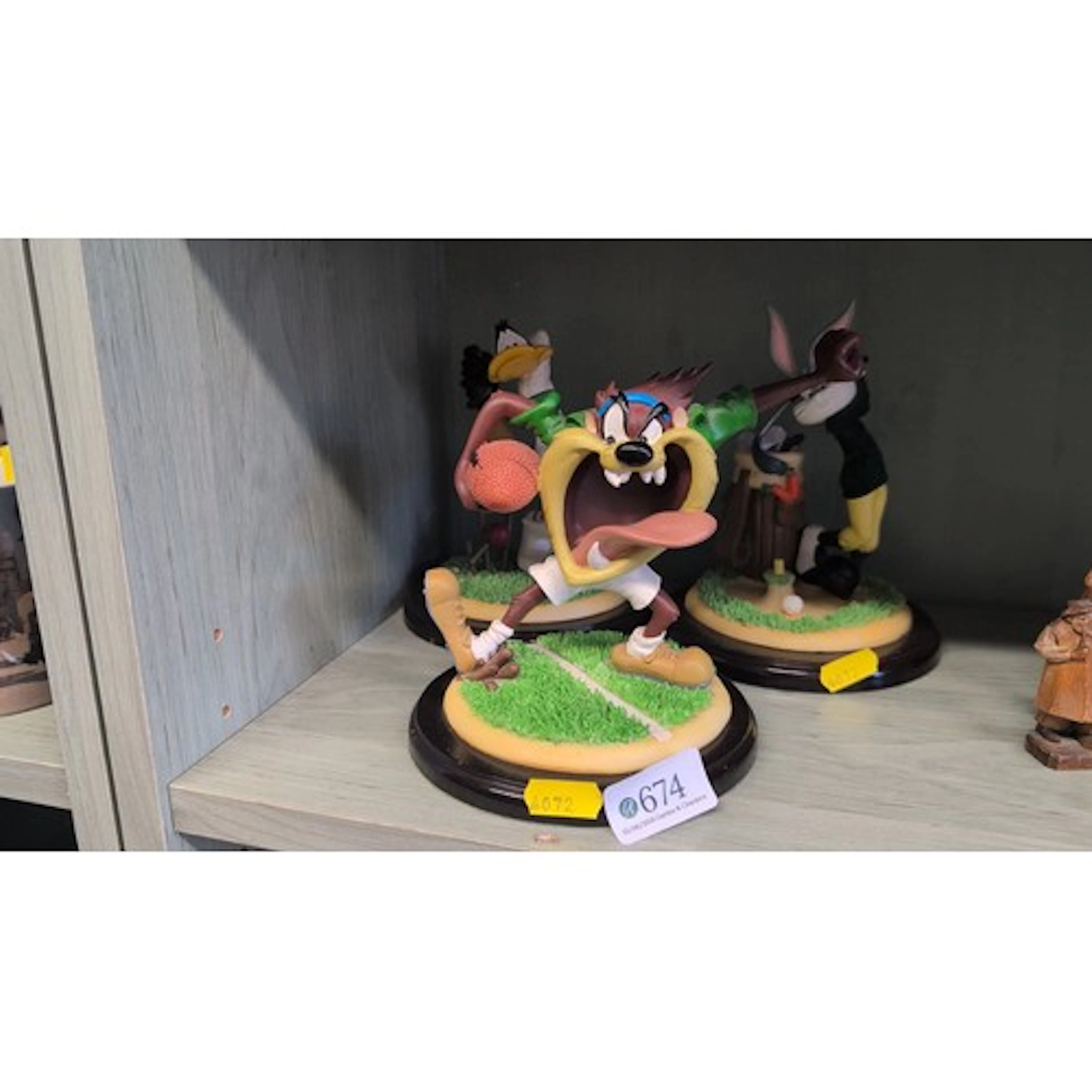 A group of three Looney Tunes polychrome resin figurines, mo...