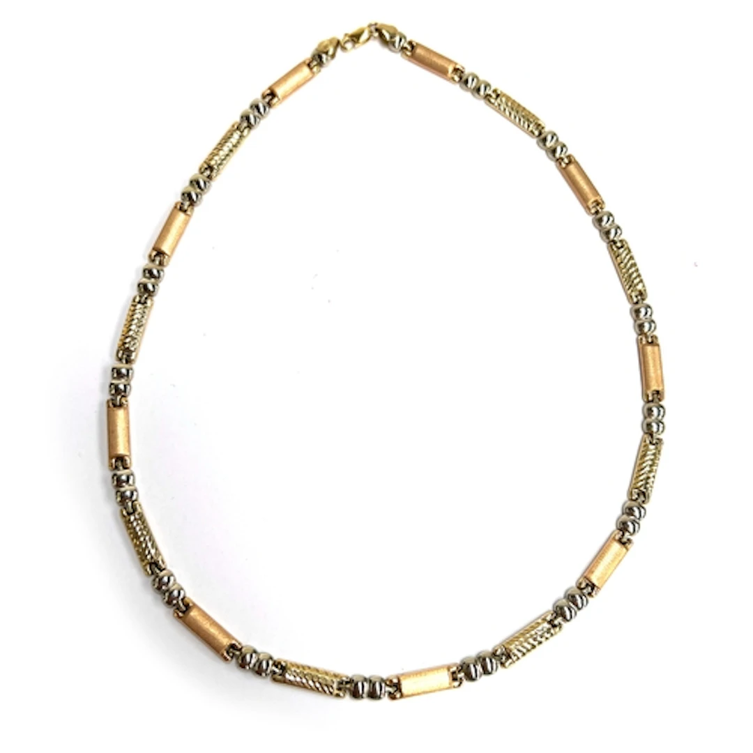 A 14ct three coloured gold necklace, the yellow gold links w...