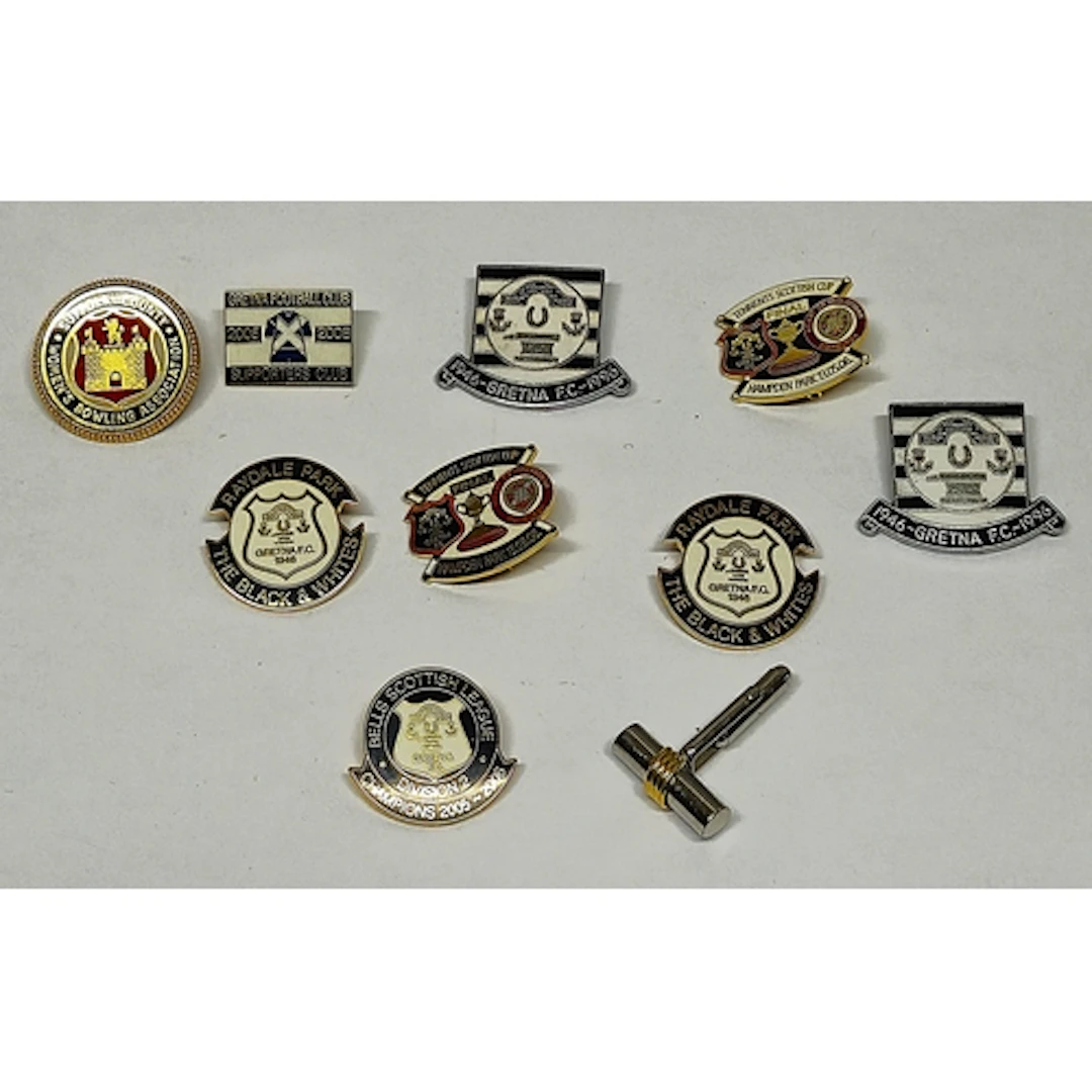 Group of Gretna F.C. pins and badges to include three for th...
