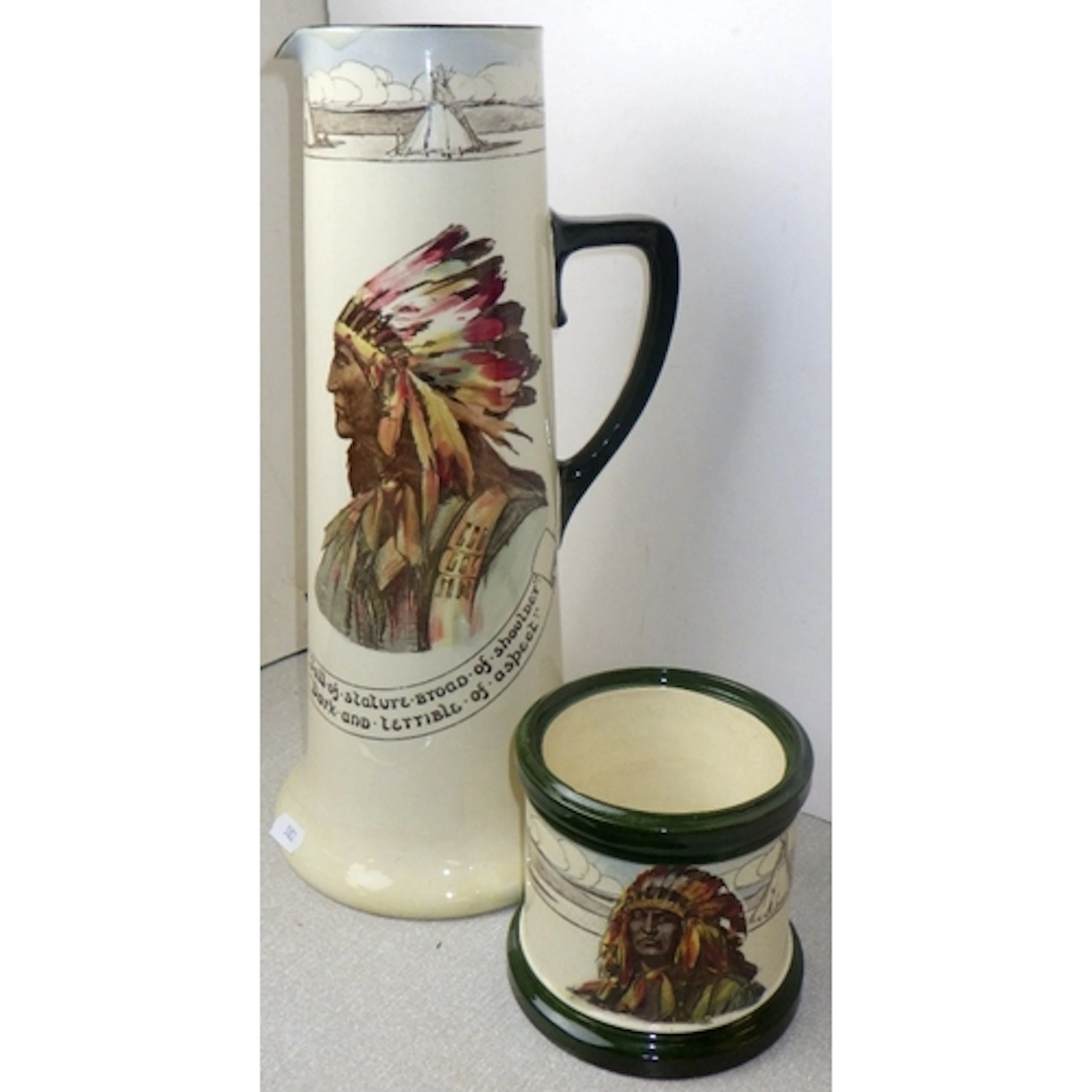 A large (repaired) Royal Doulton Hiawatha pitcher, 38cm, and...