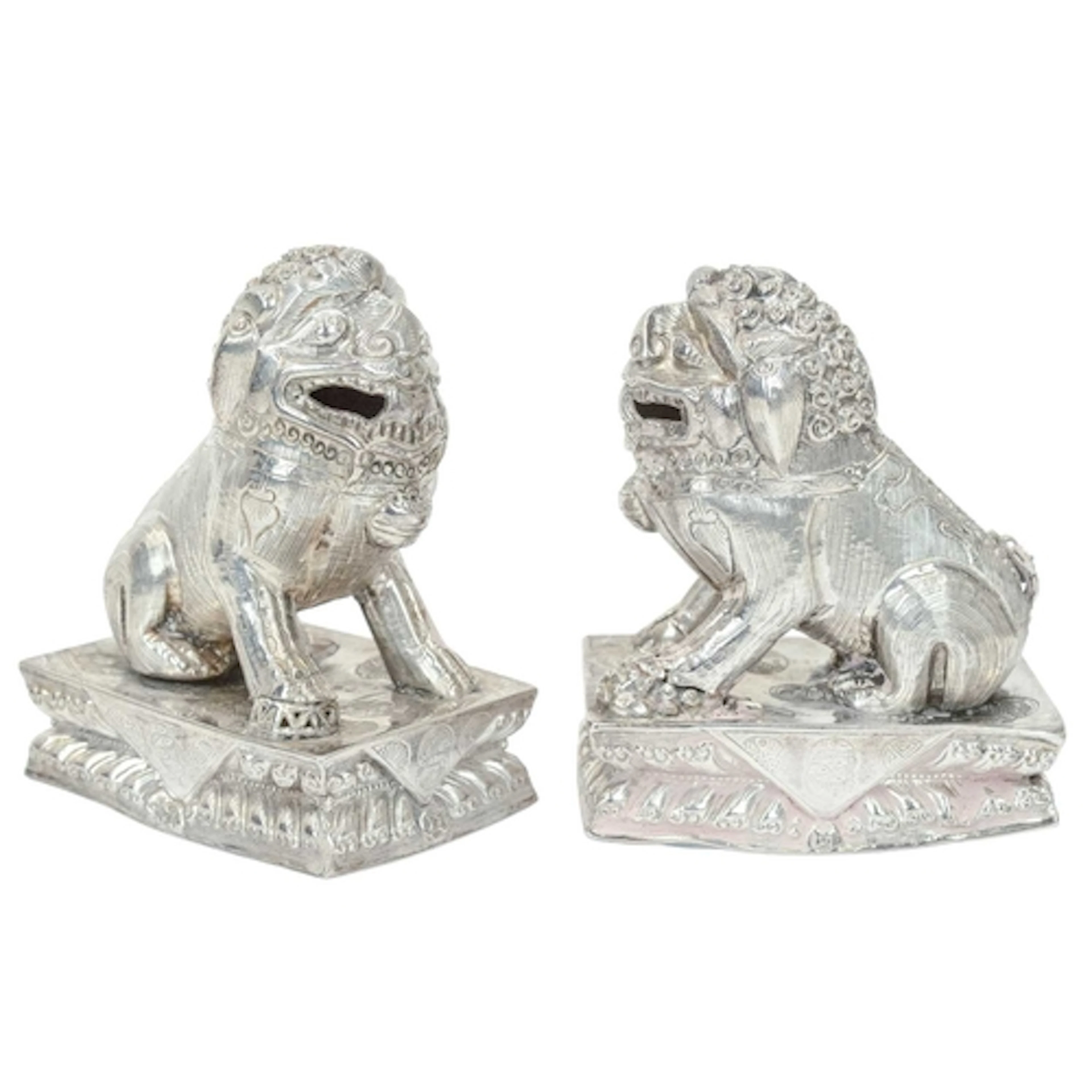 A pair of Chinese silver foo dogs. 19th/early 20th century, ...