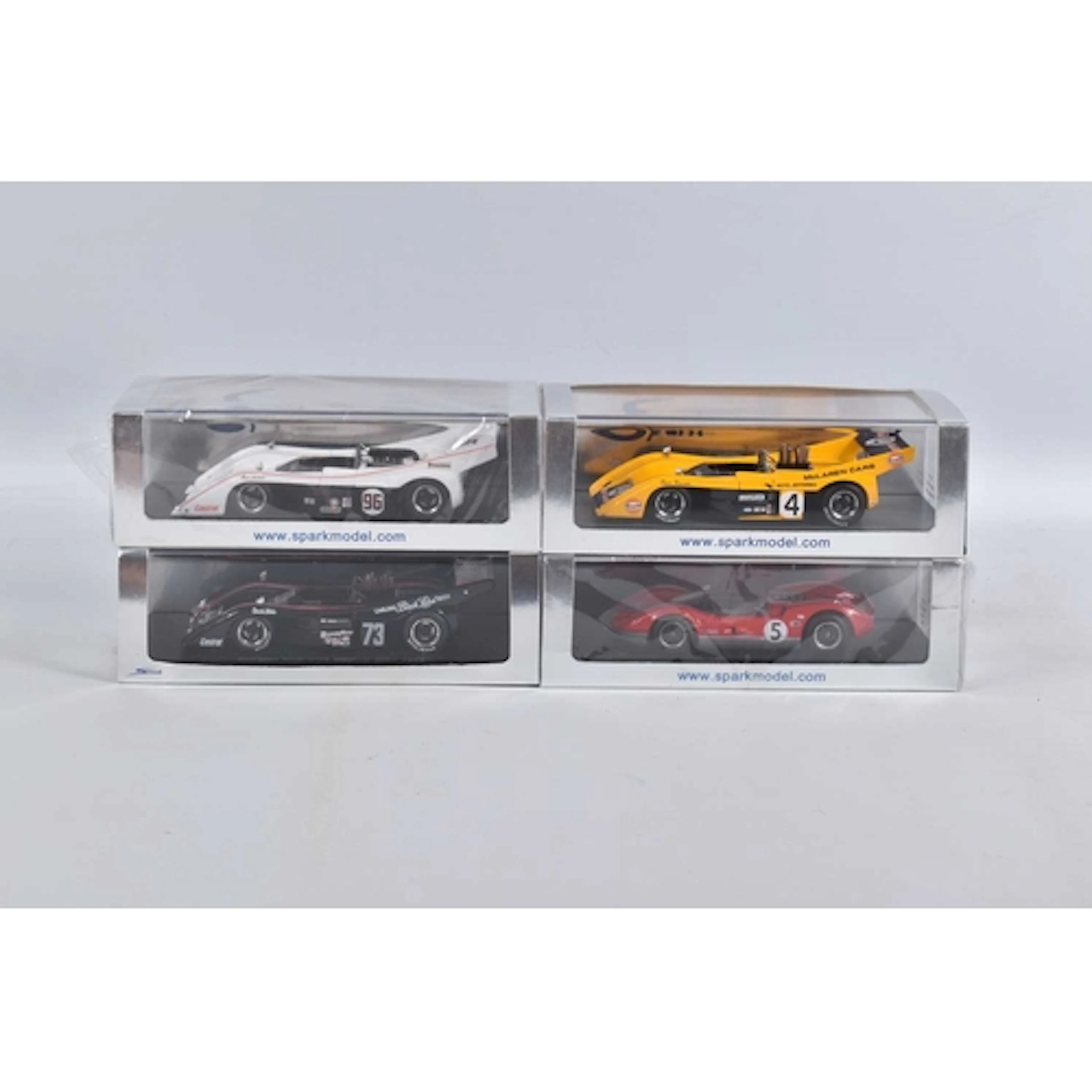 FOUR BOXED MINIMAX SPARK MODEL RACING VEHICLES, to include a...