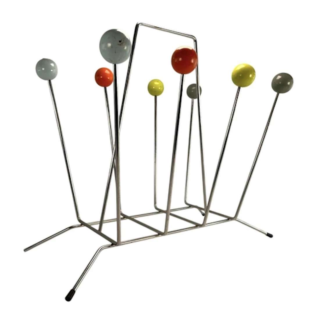 A 20th century Eames-style atomic magazine rack. Wirework co...