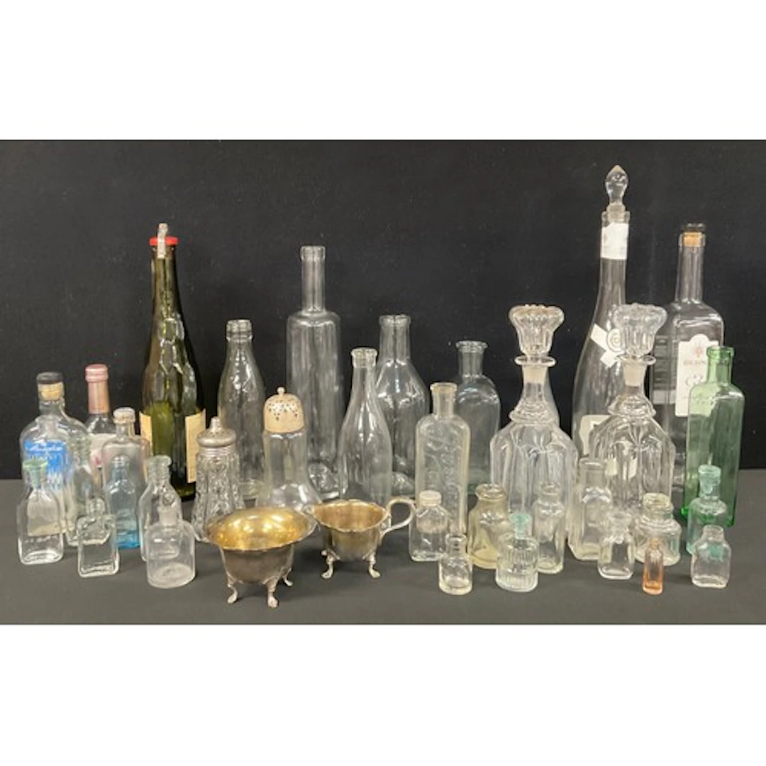 A pair of Victorian pillar moulded glass decanters and stopp...