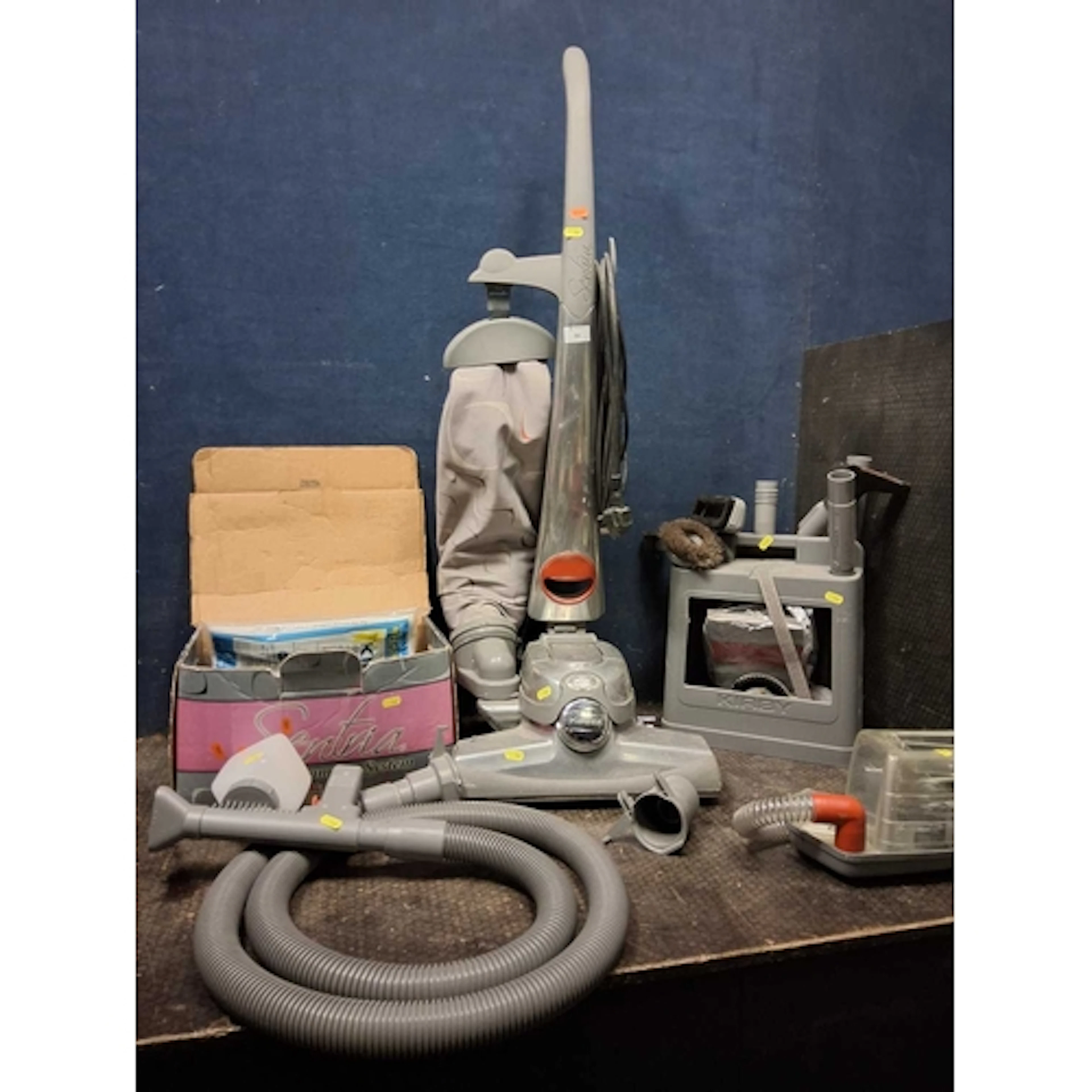 A KIRBY SENTRIA VACUUM CLEANER, with various accessories inc...