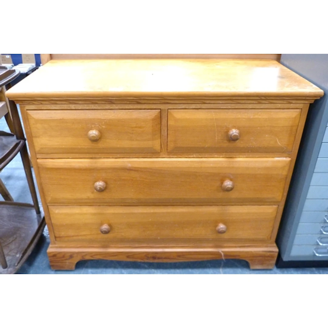 Pine chest of two short and two long drawers. 91cm wide.