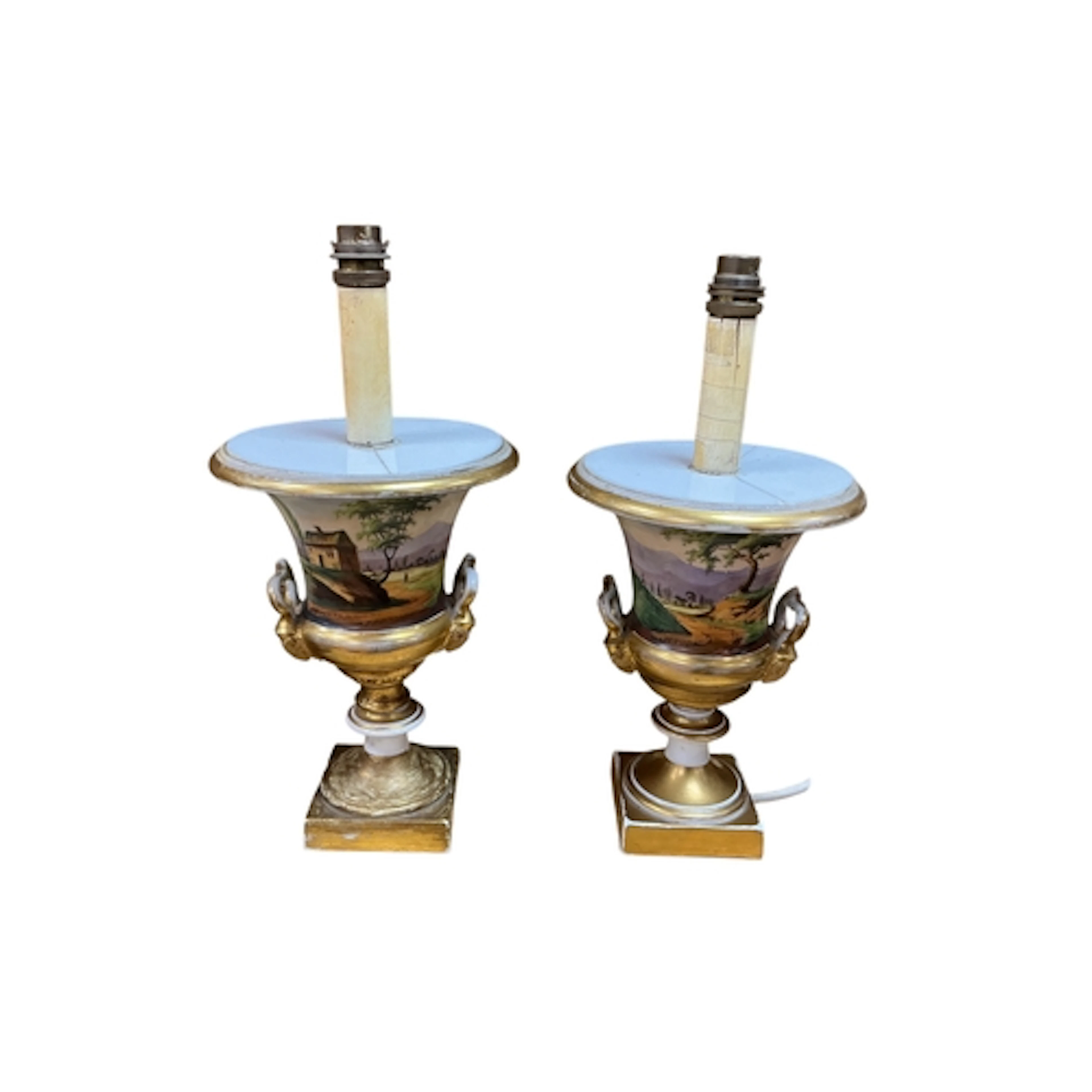 A pair of Paris porcelain campana urns adapted as table lamp...