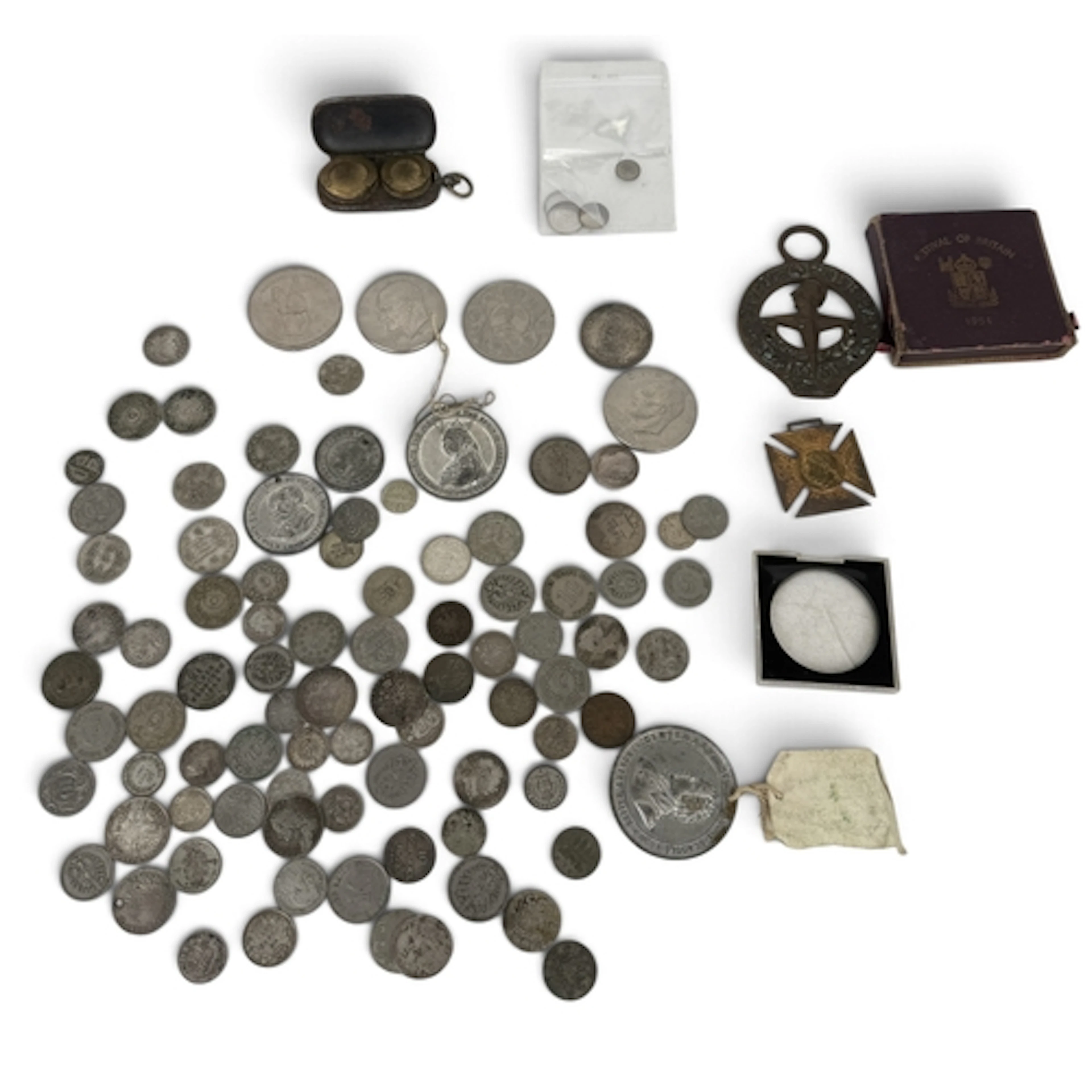 A COLLECTION OF SILVER COLOURED COINS AND MEDALS