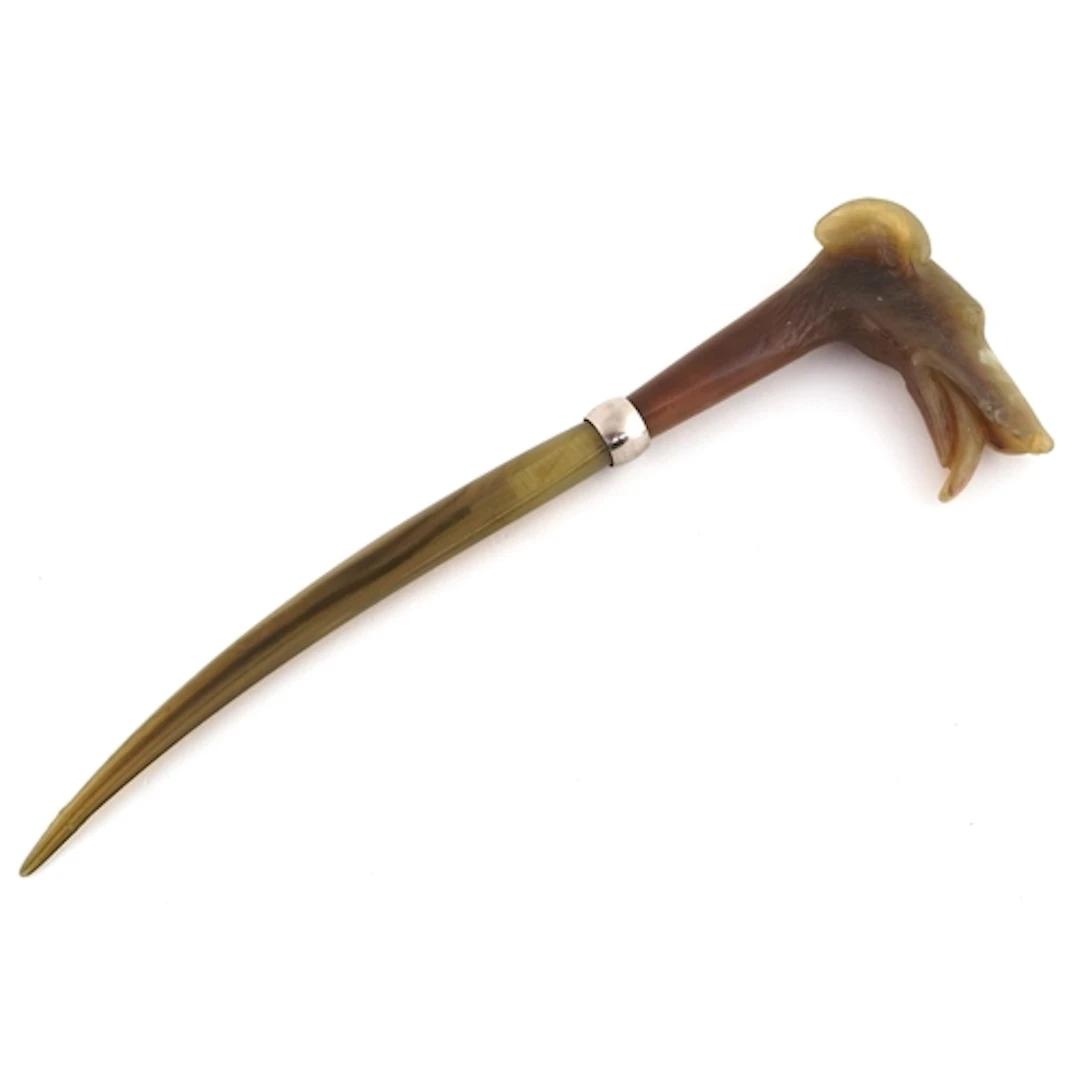 20th century carved horn letter opener in the form of a dog'...