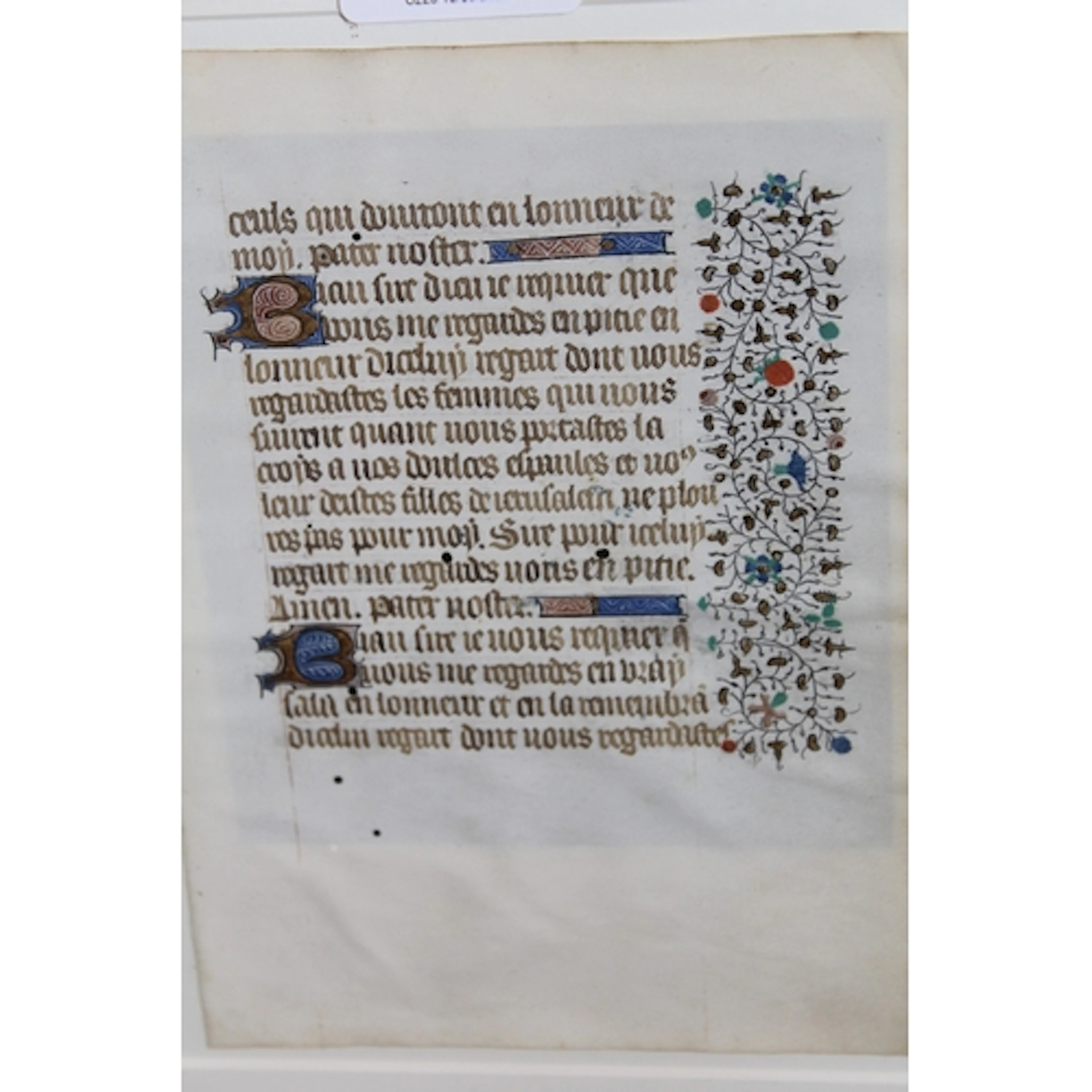 Medieval illuminated text on vellum, inscribed verso ' Leaf ...