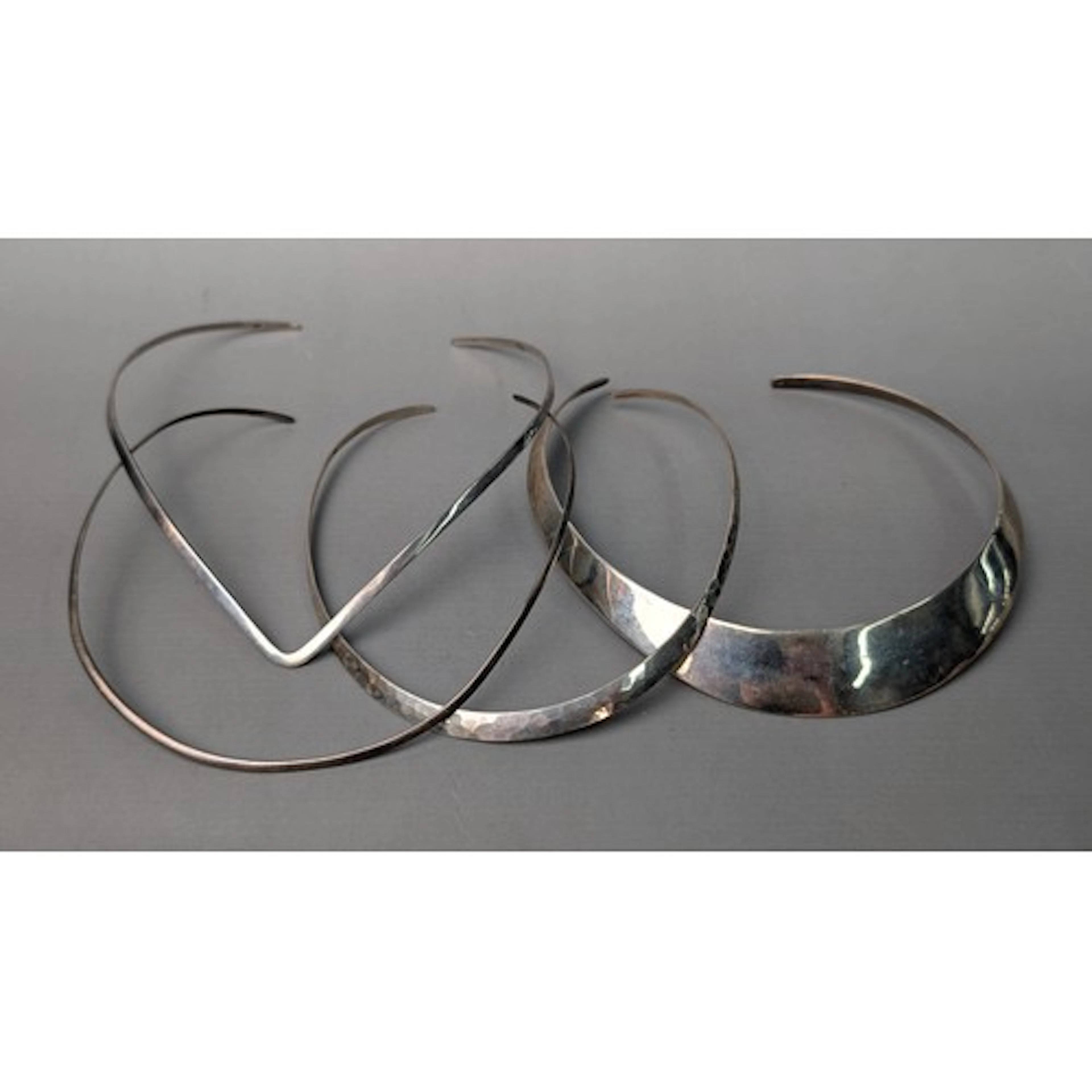 Four silver chokers, gross weight 95 grams