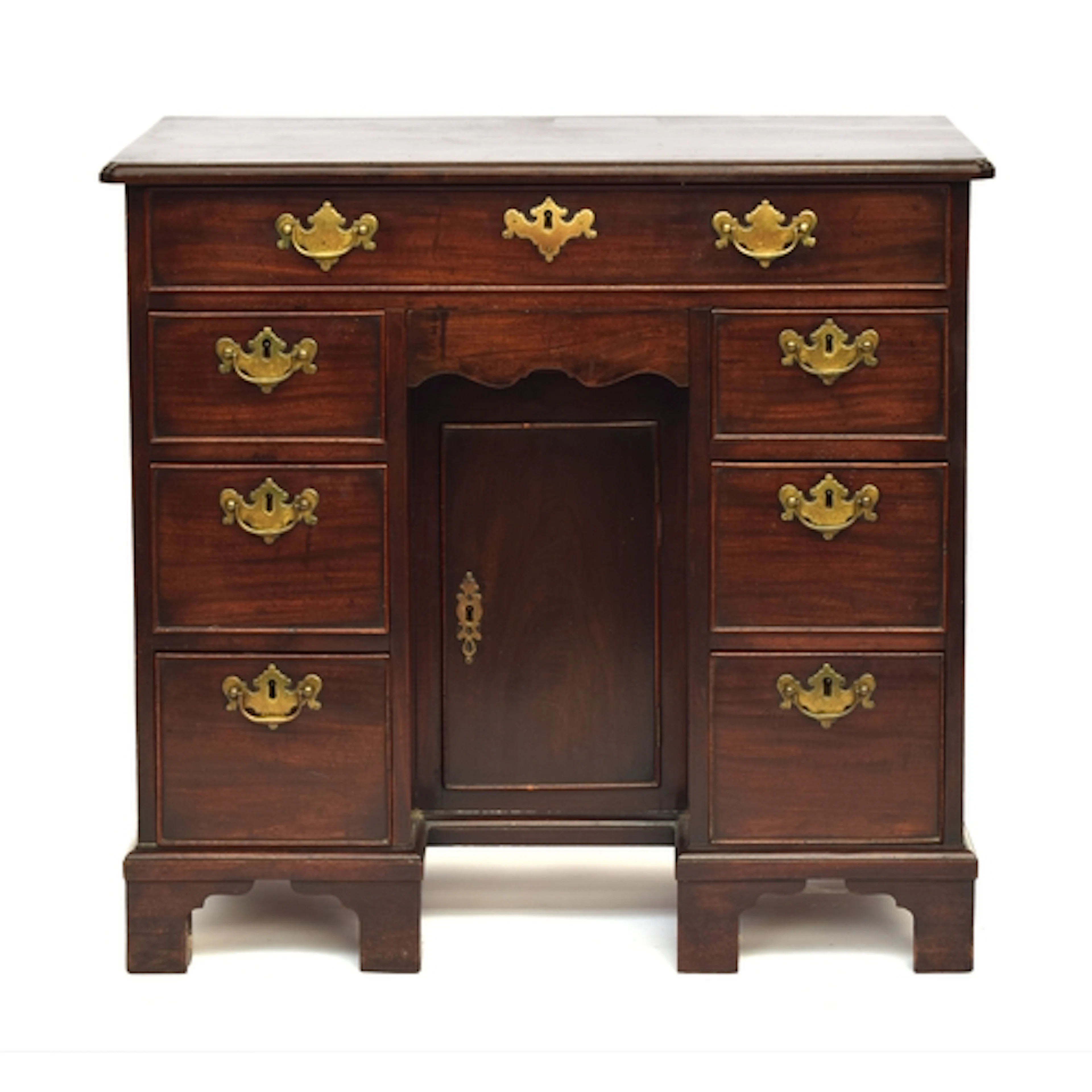 A George III mahogany kneehole ladies dressing table, the mo...