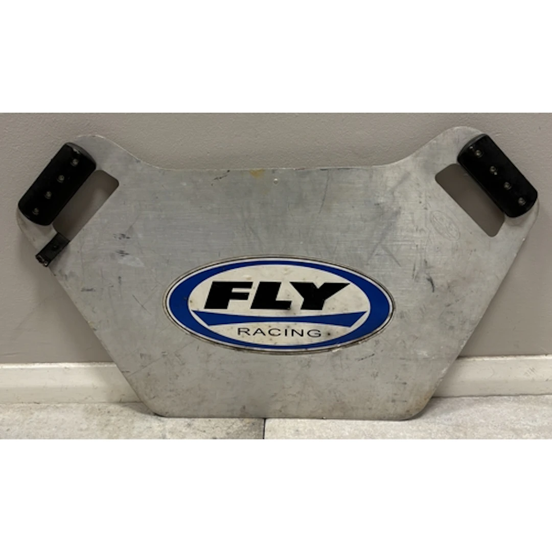 A hand-held "Fly Racing" pit stop sign. Approx. 65cm x 39cm....