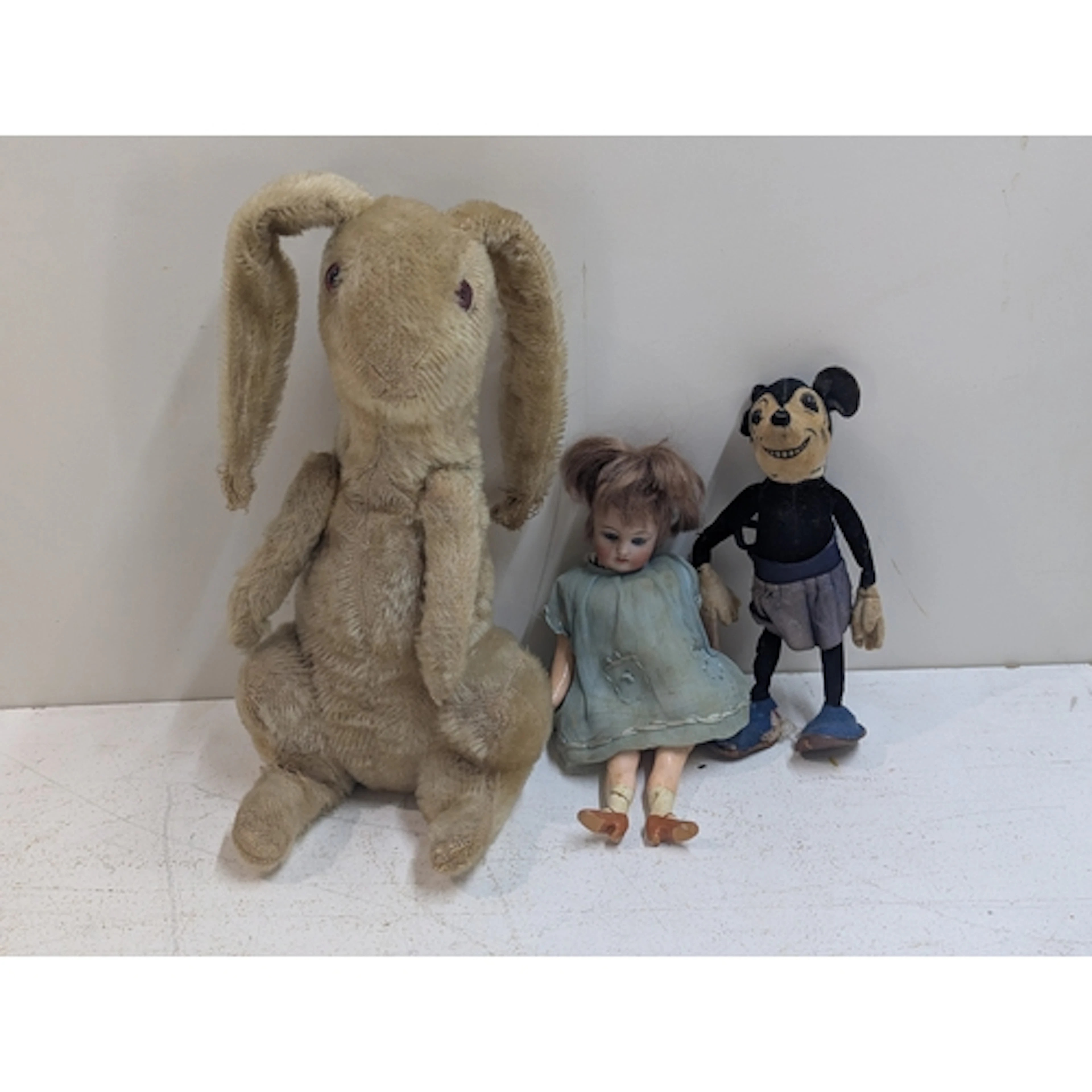 Vintage toys and a doll to include a mohair rabbit with elon...