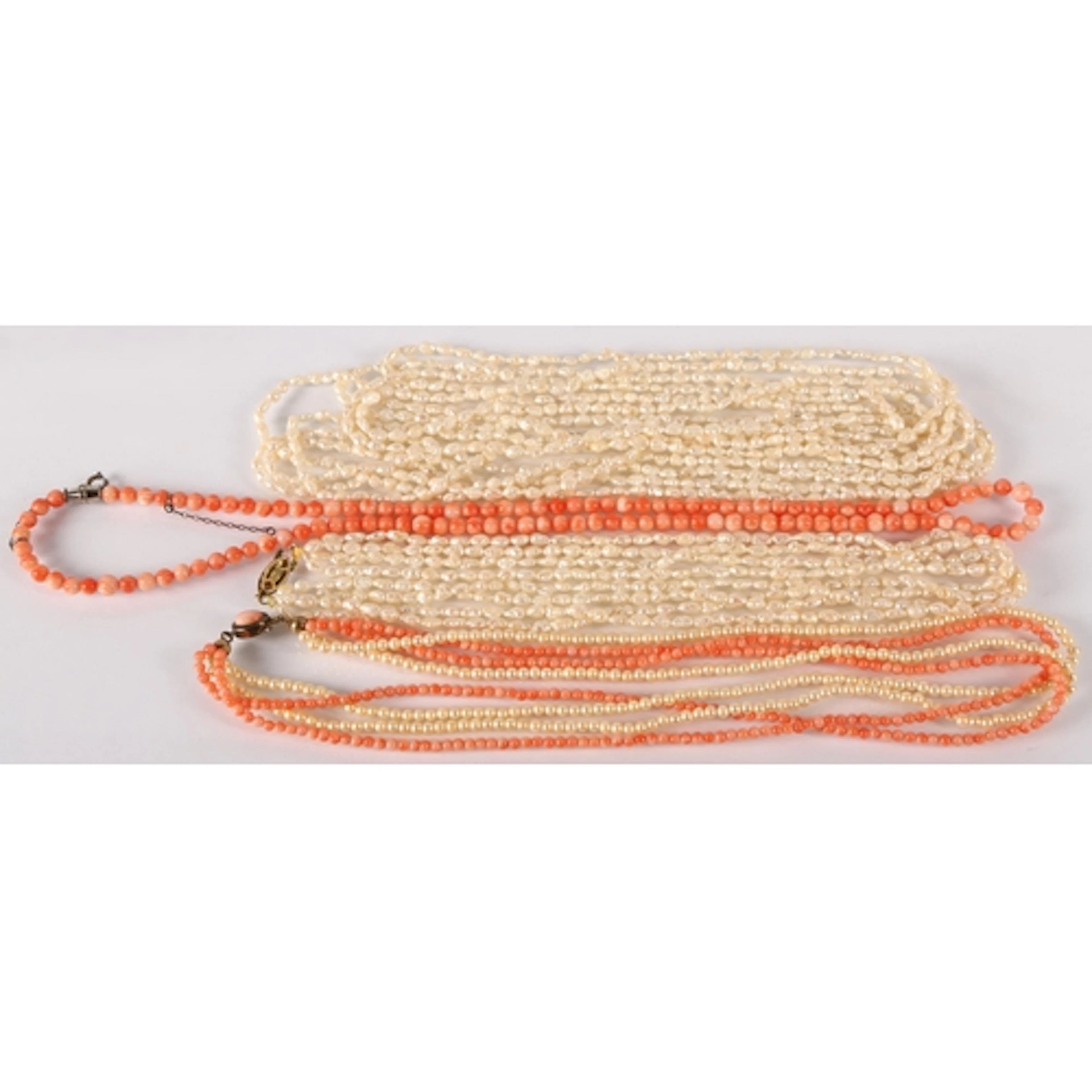 Vintage pearl necklaces and coral colour beaded necklaces