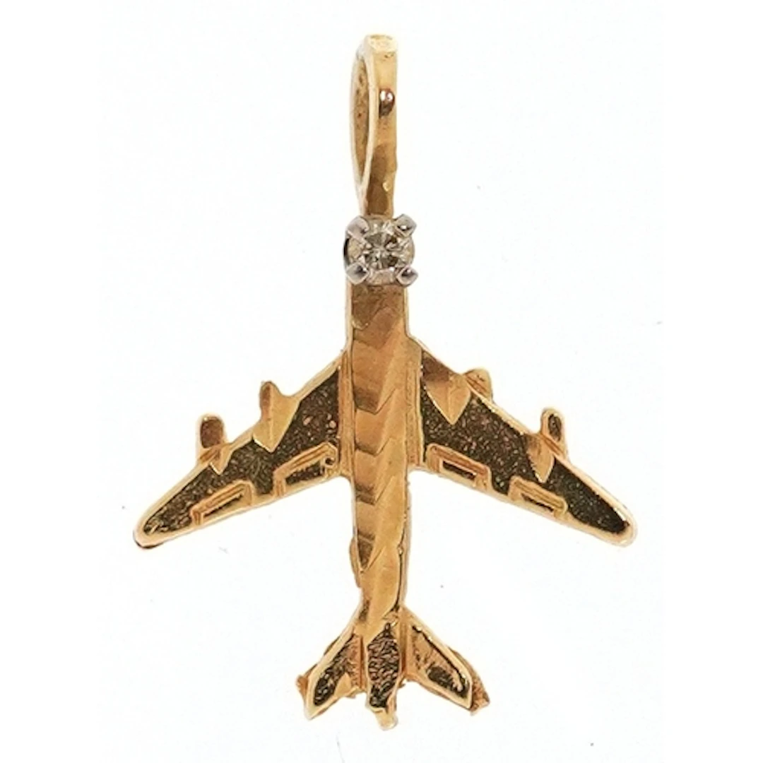 14K gold diamond aeroplane pendant, 1.6cm high, 0.4g.