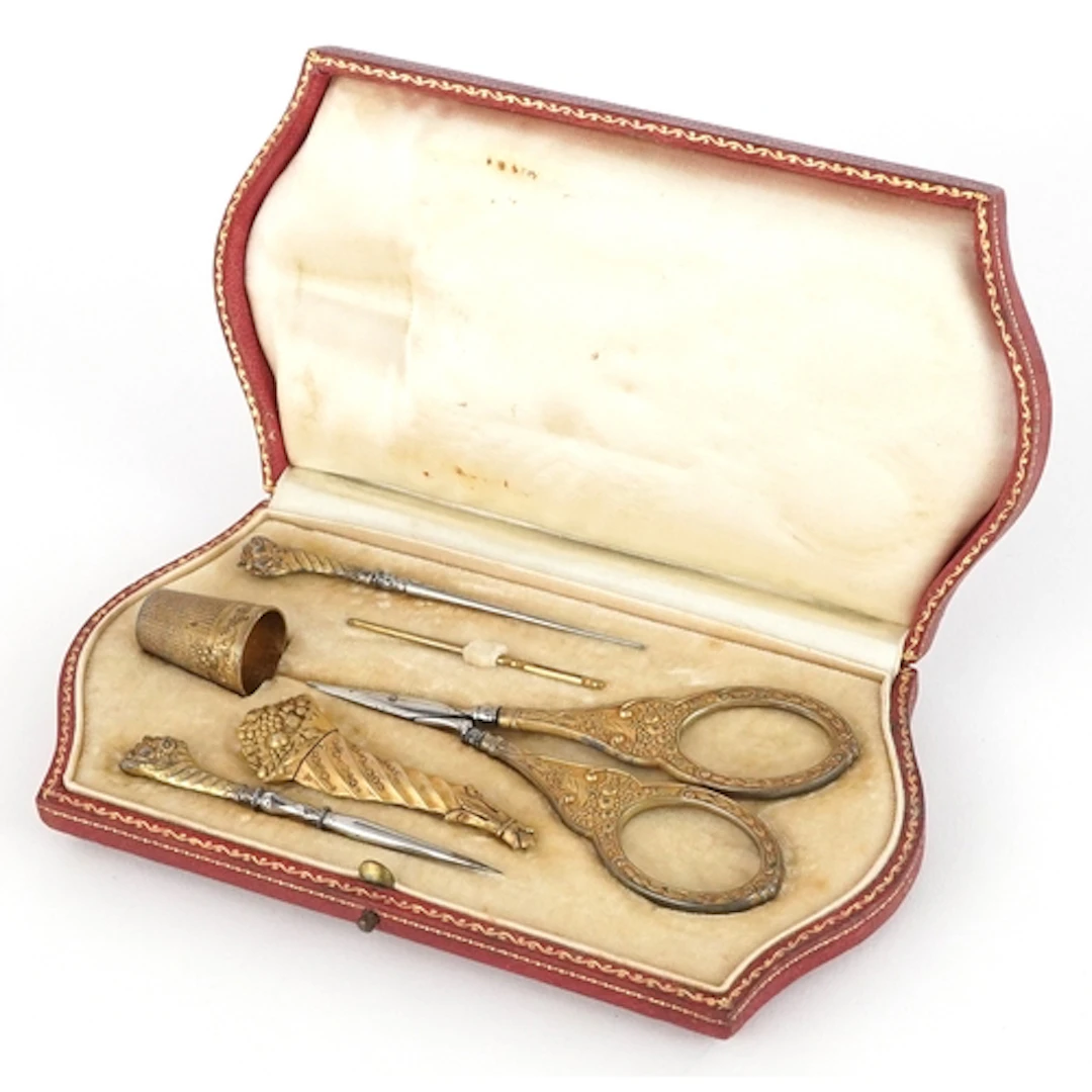 19th century continental silver gilt sewing set including a ...