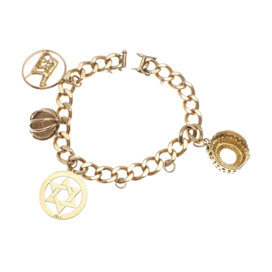 A 9CT GOLD CURB LINK BRACELET. with concealed clasp, suspend...