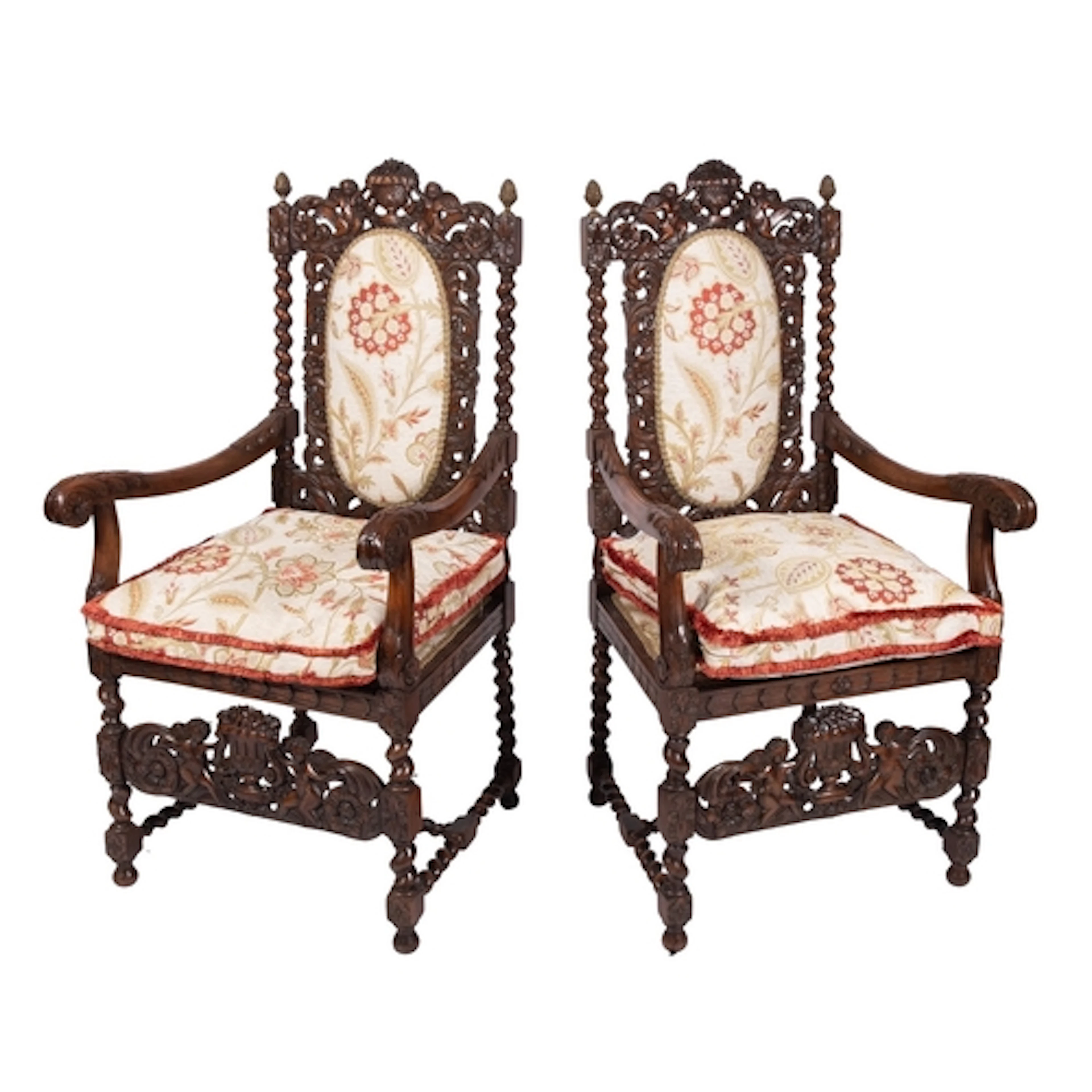 A pair of carved beechwood open armchairs in the Charles II ...