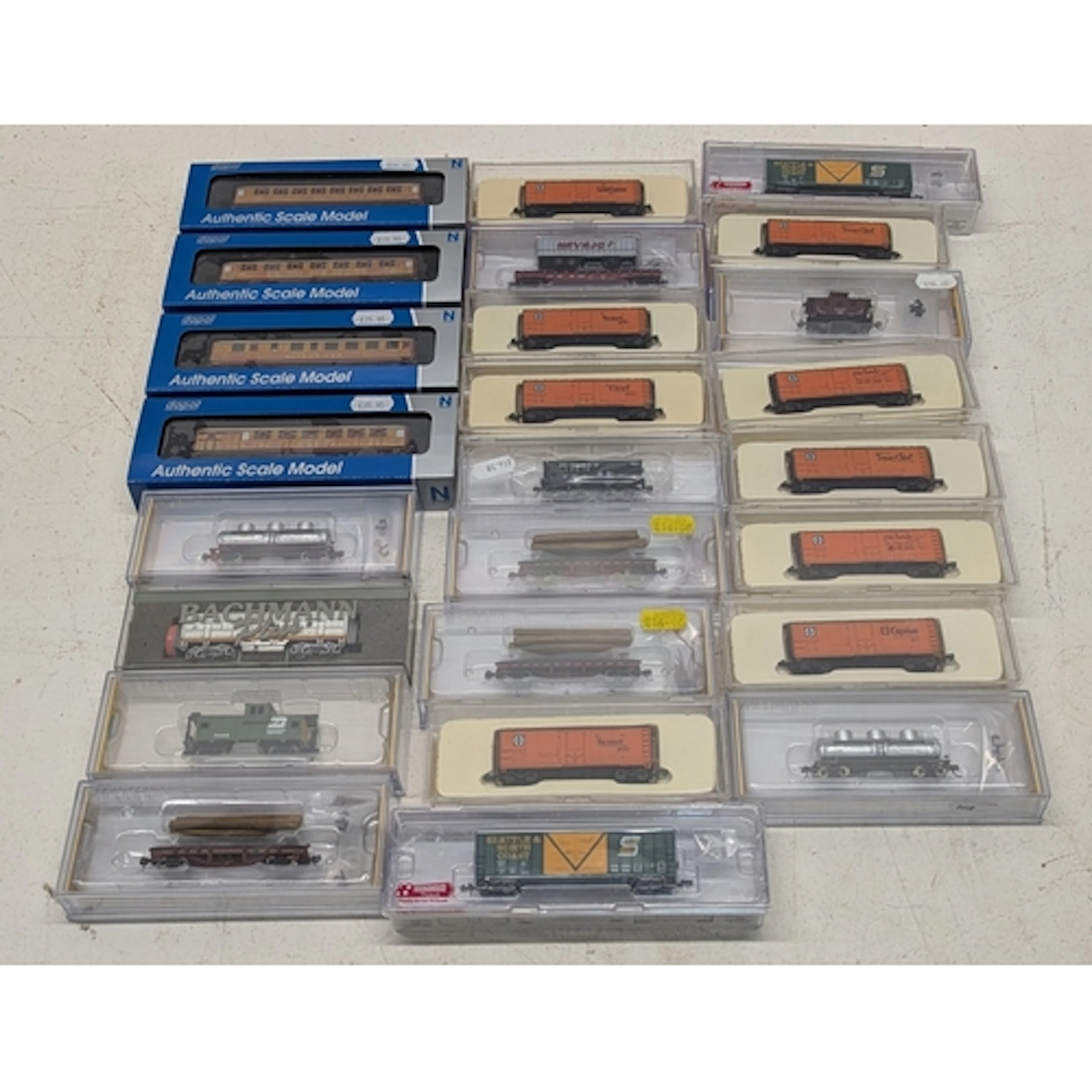 Twenty-four cased examples of N scale rolling stock to inclu...