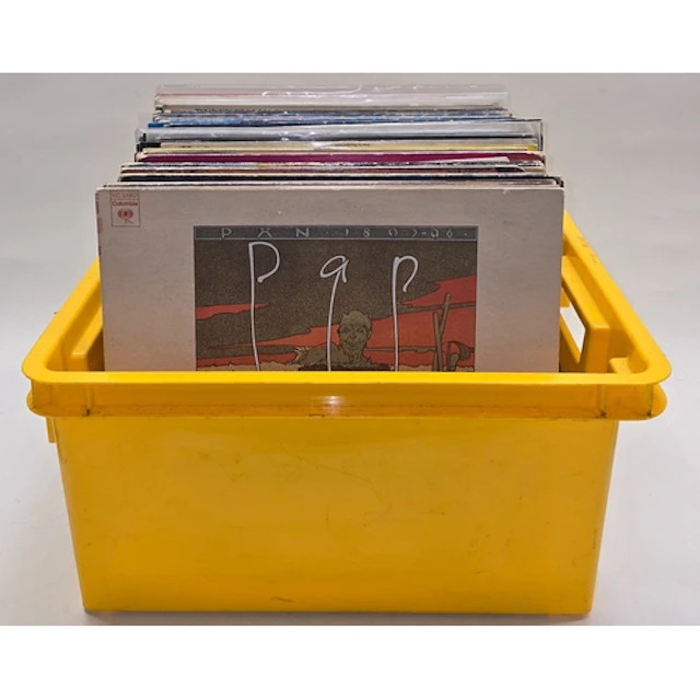 A plastic tub containing a large collection of vinyl LP reco...