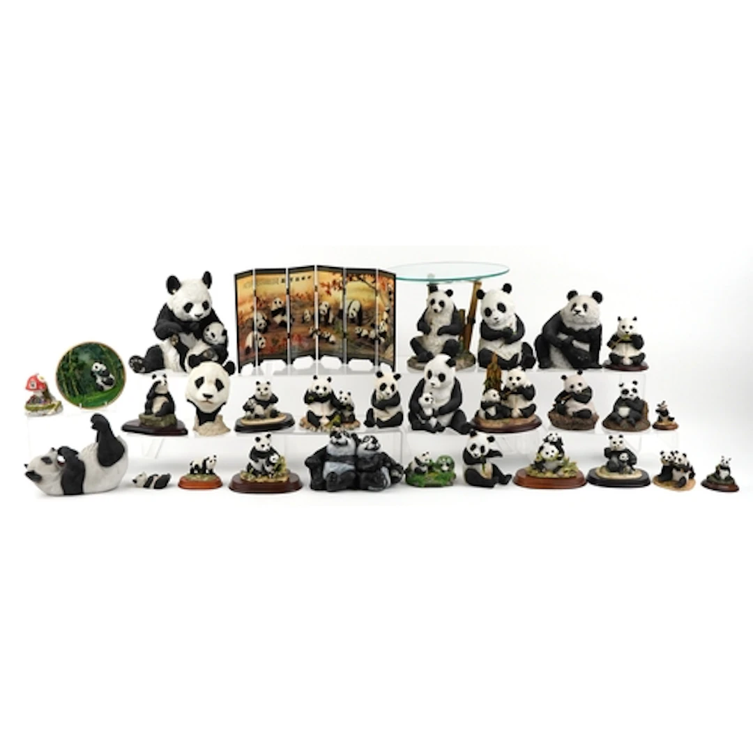 Large collection of decorative composite models of pandas in...
