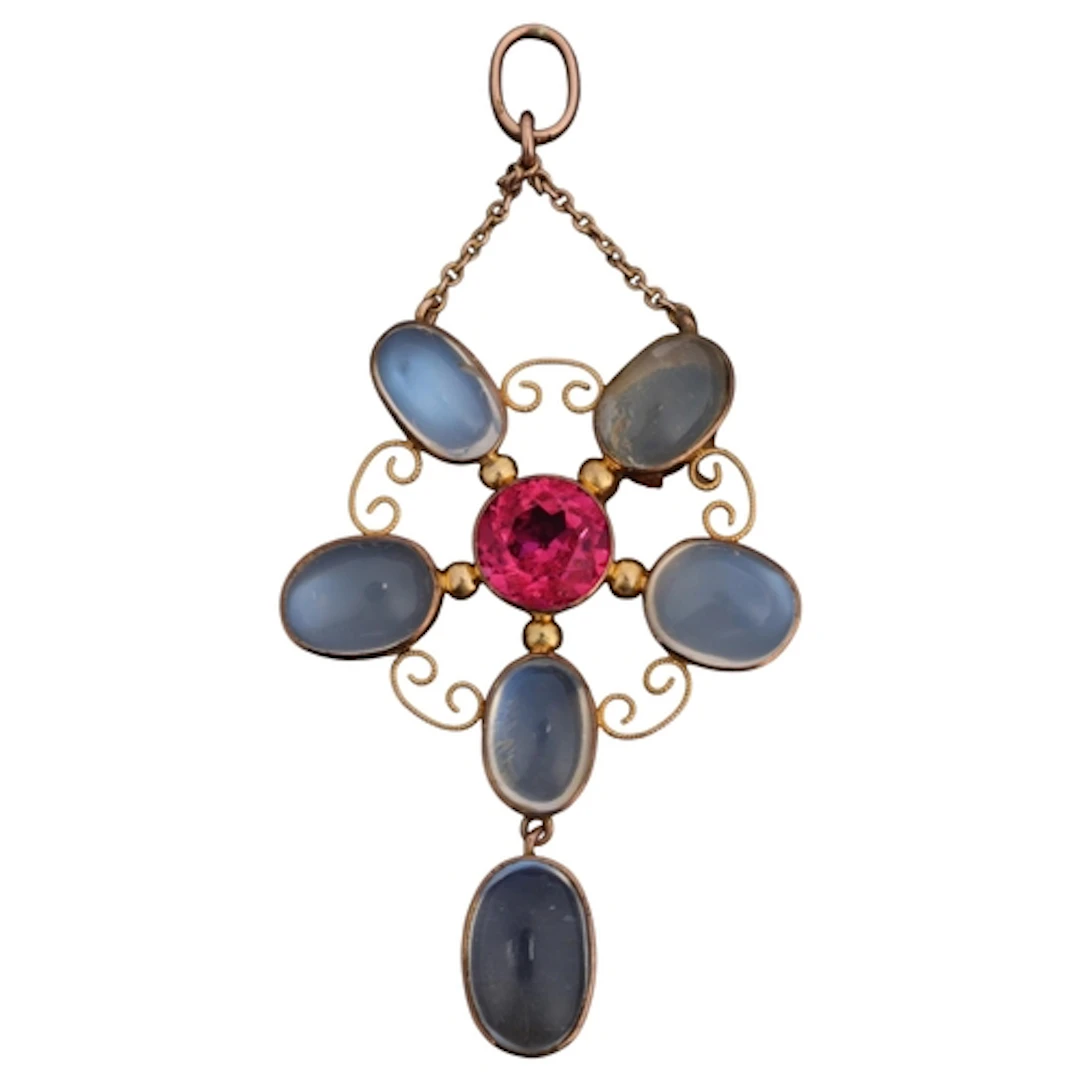 An Edwardian 9ct rose gold moonstone and pink paste openwork...