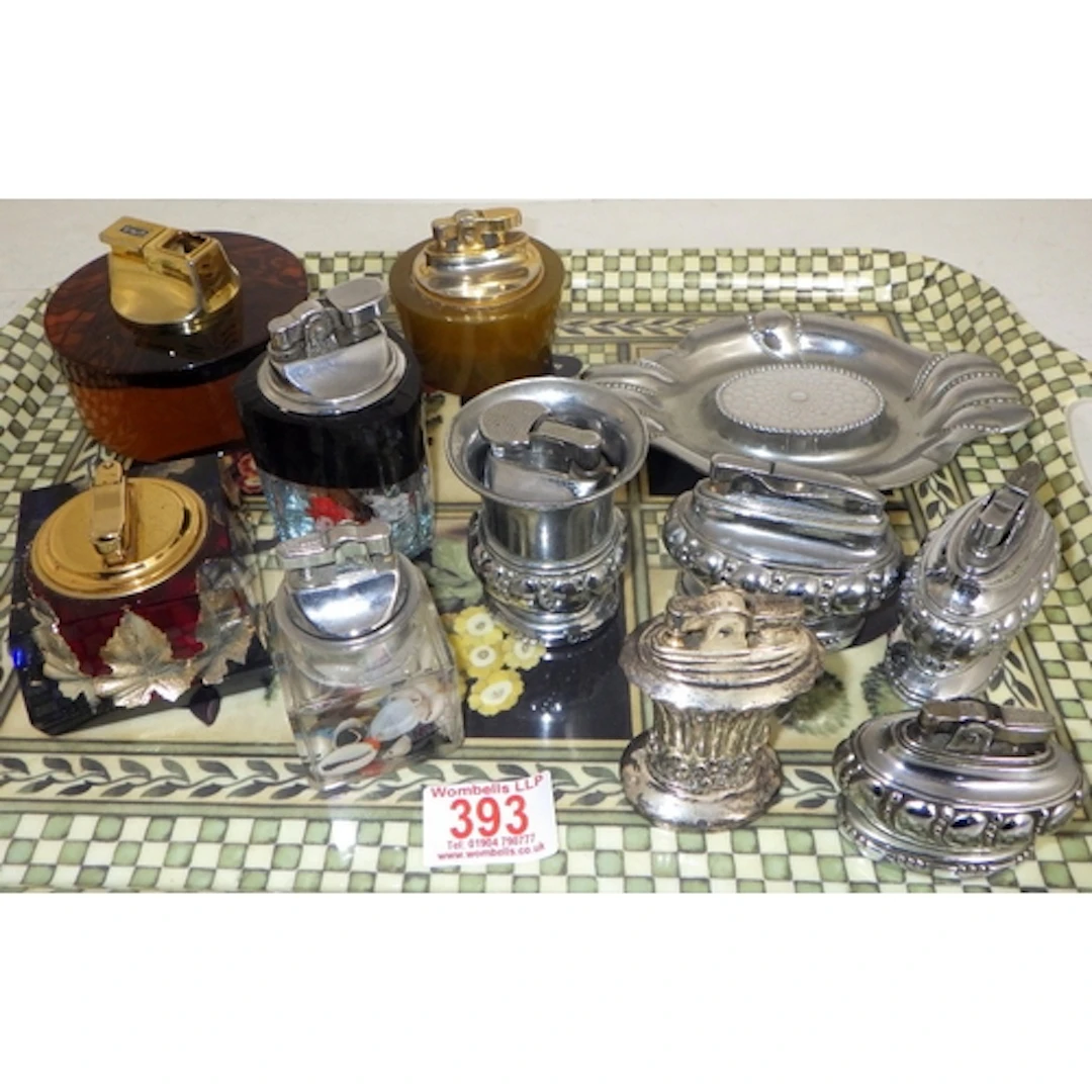 A group of misc table lighters