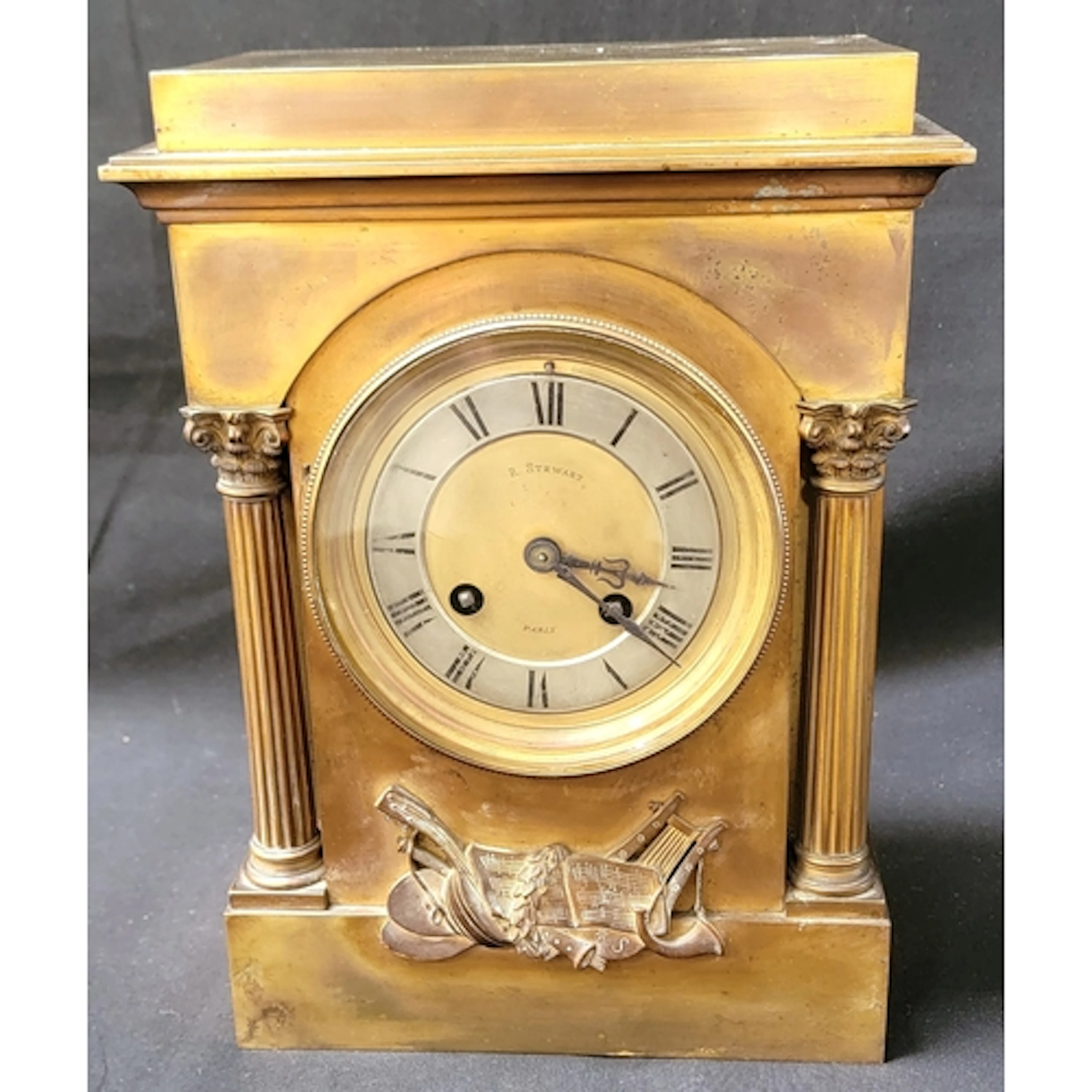FRENCH NEO-CLASSICAL STYLE MANTEL CLOCK in brass with stepp...
