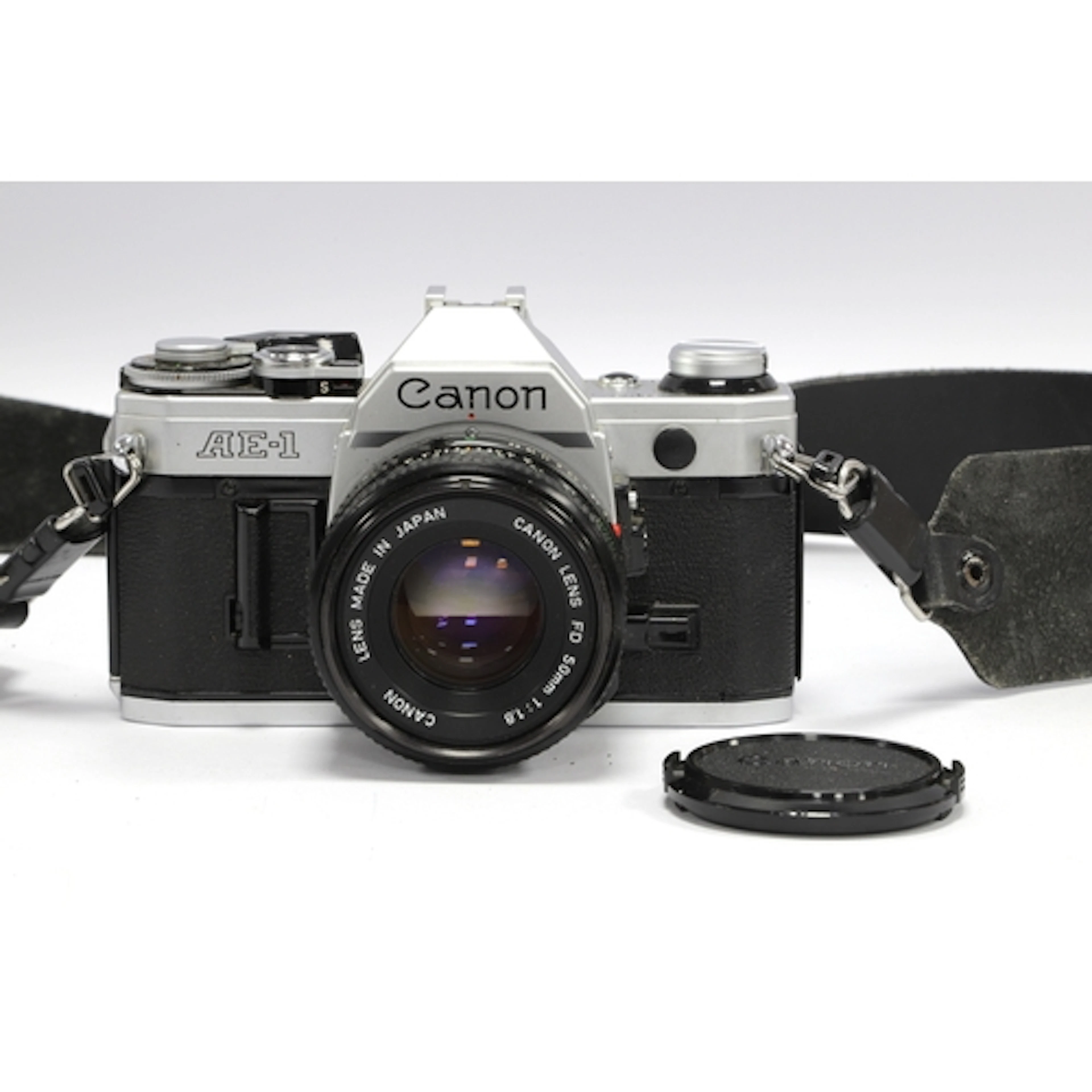 Canon AE-1 35mm SLR Film Camera with attached Canon FD 50mm ...