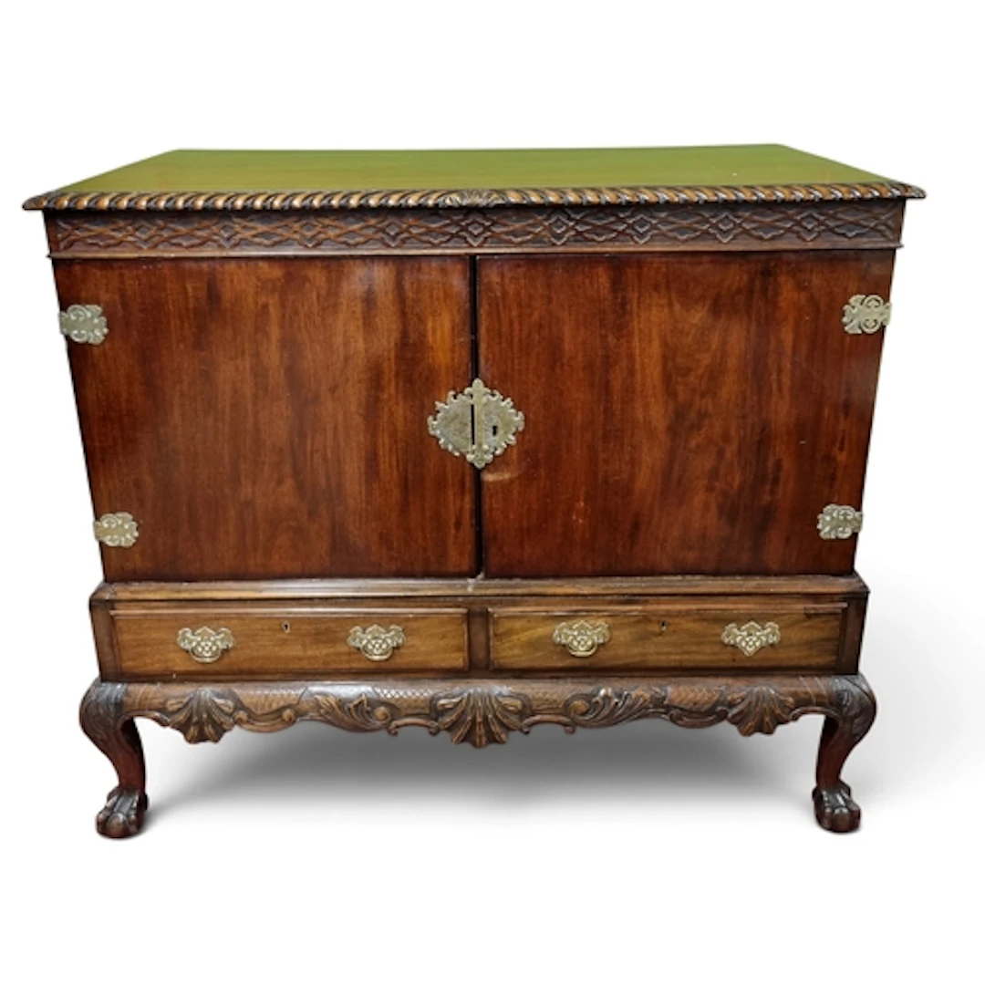 A 19th Century Mahogany Irish Side Cabinet with highly carve...