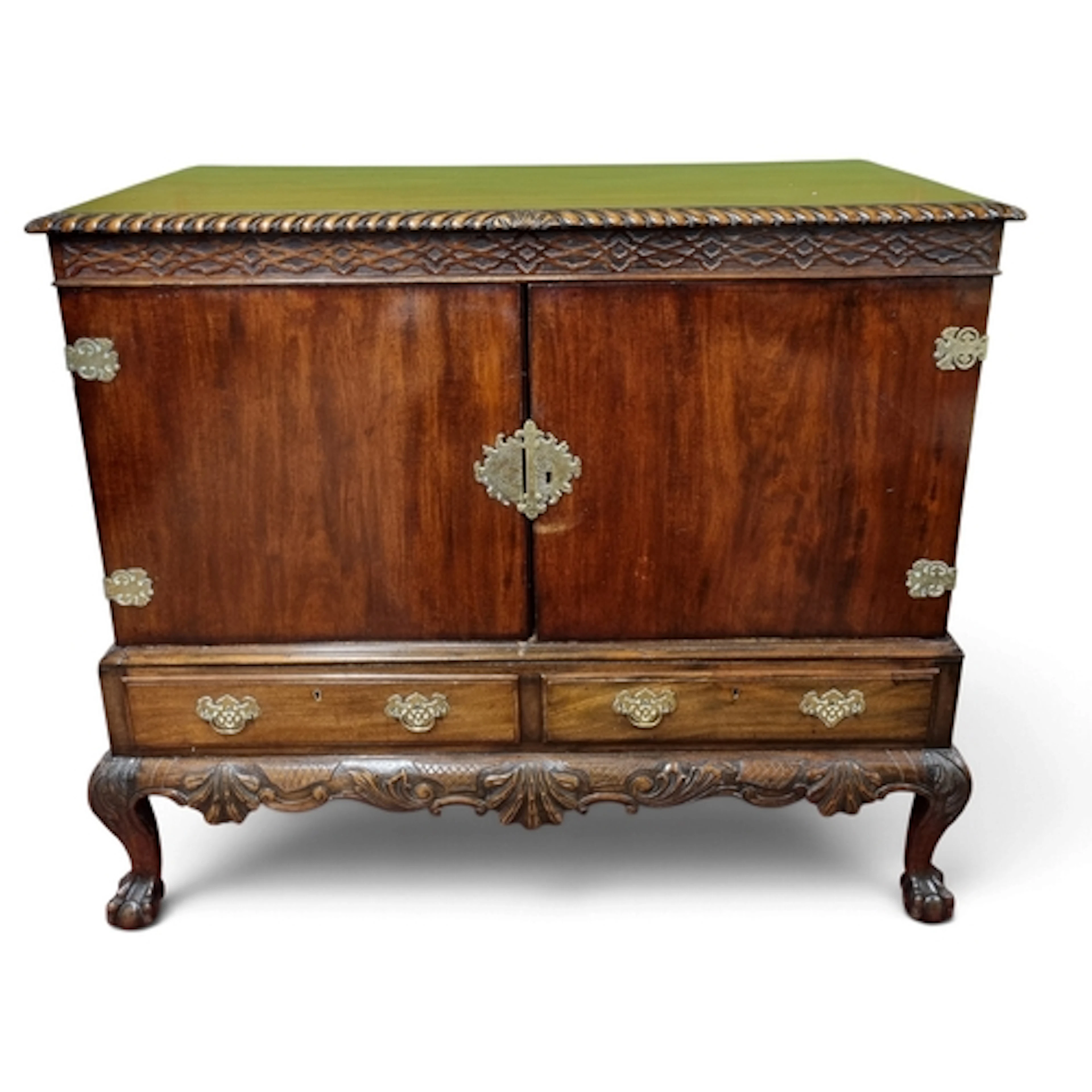 A 19th Century Mahogany Irish Side Cabinet with highly carve...