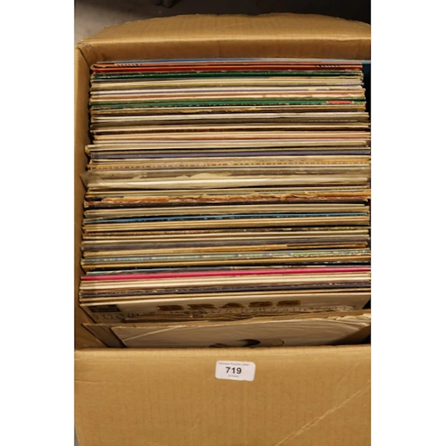 Box containing classical and musical vinyl records