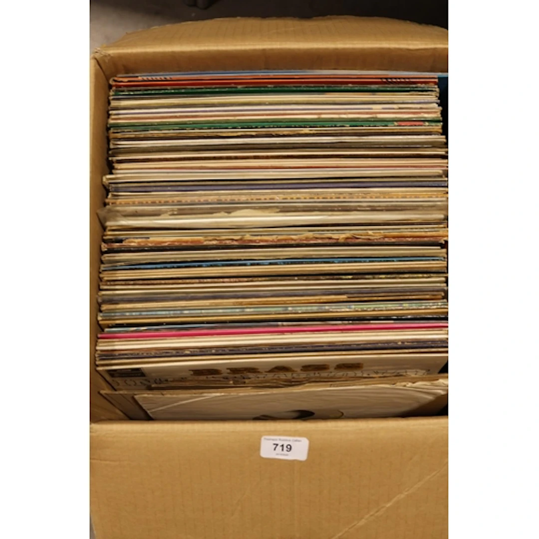 Box containing classical and musical vinyl records