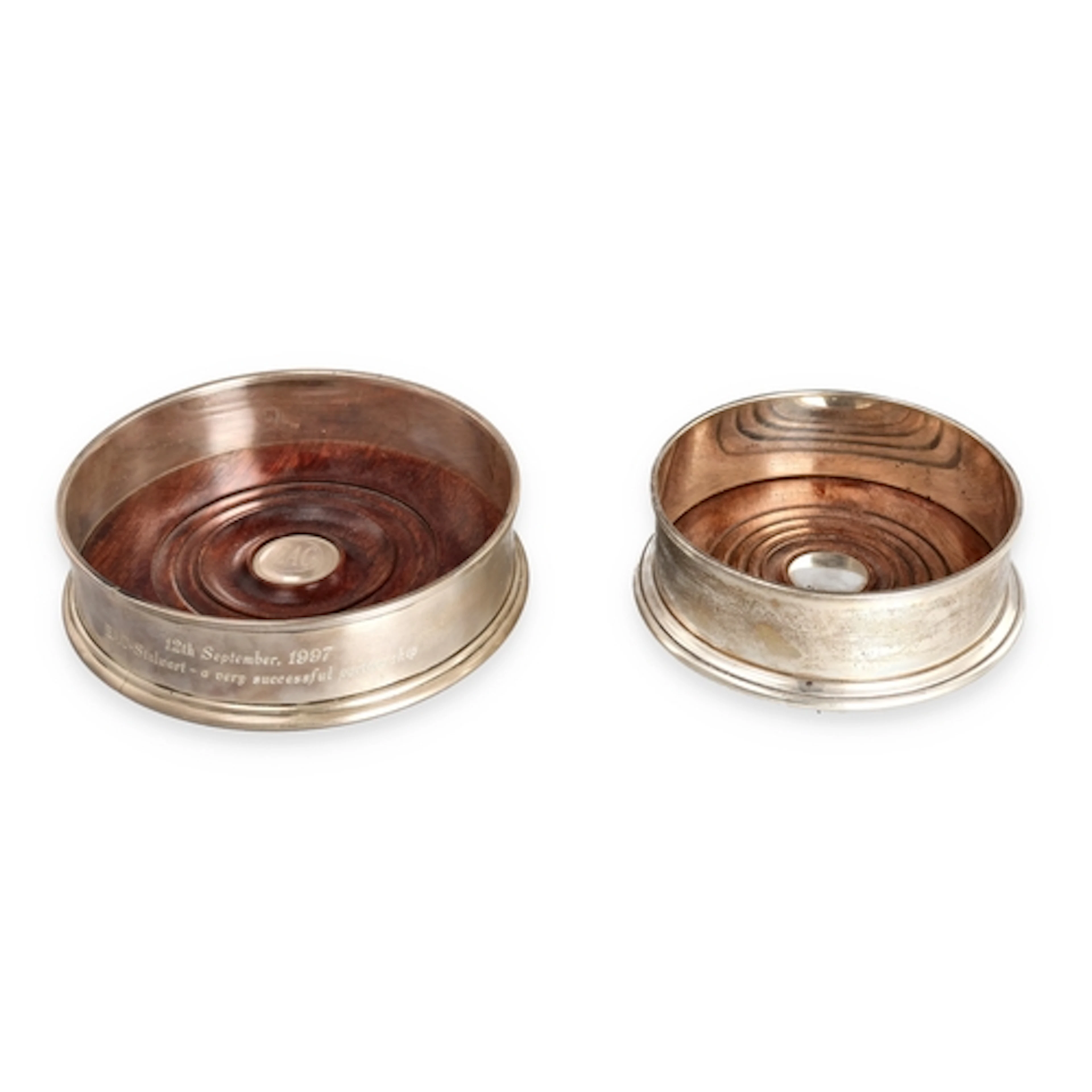 TWO MODERN SILVER WINE COASTERS, IN GEORGE III STYLE With tu...