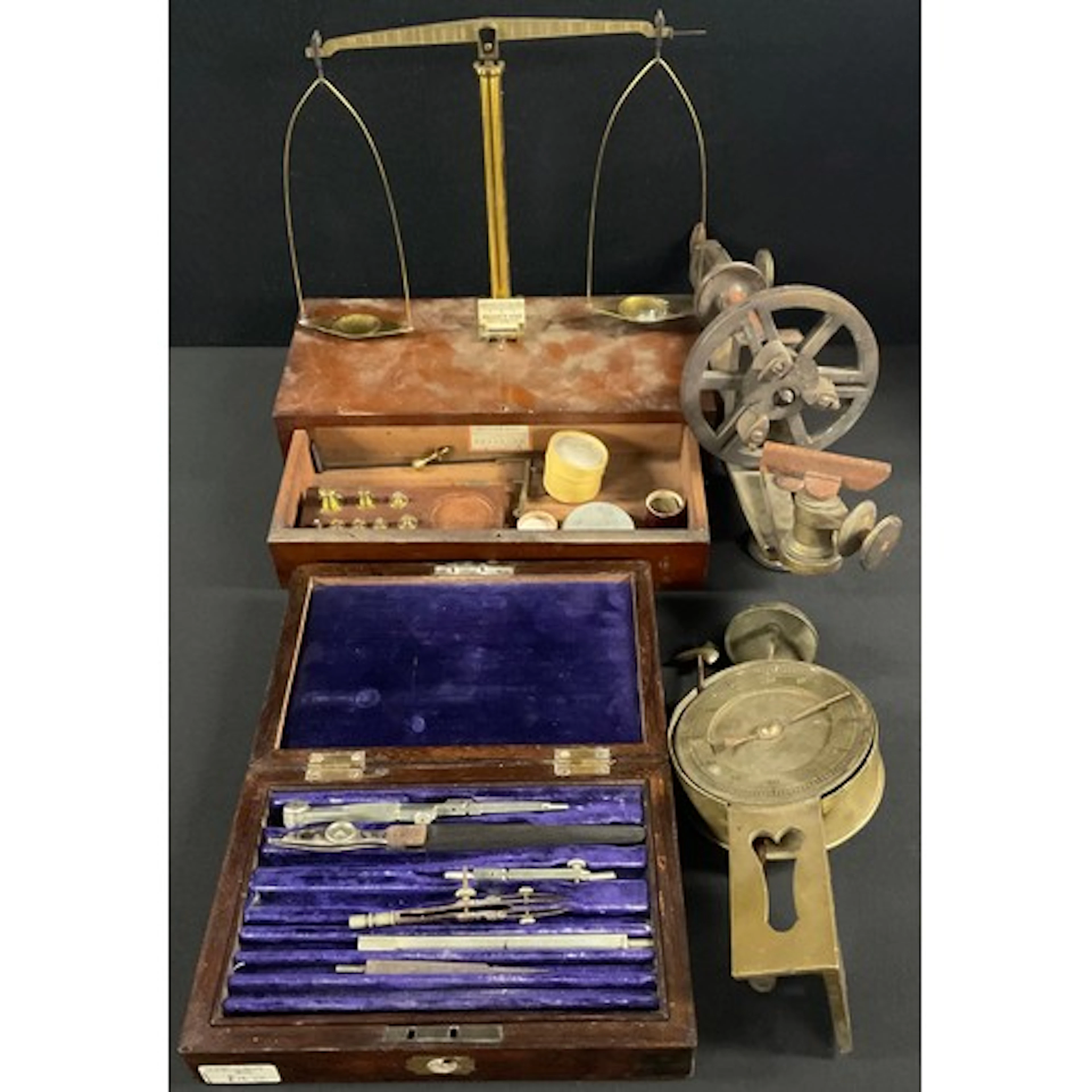 A set of 19th Century Travelling brass beam balance scales o...