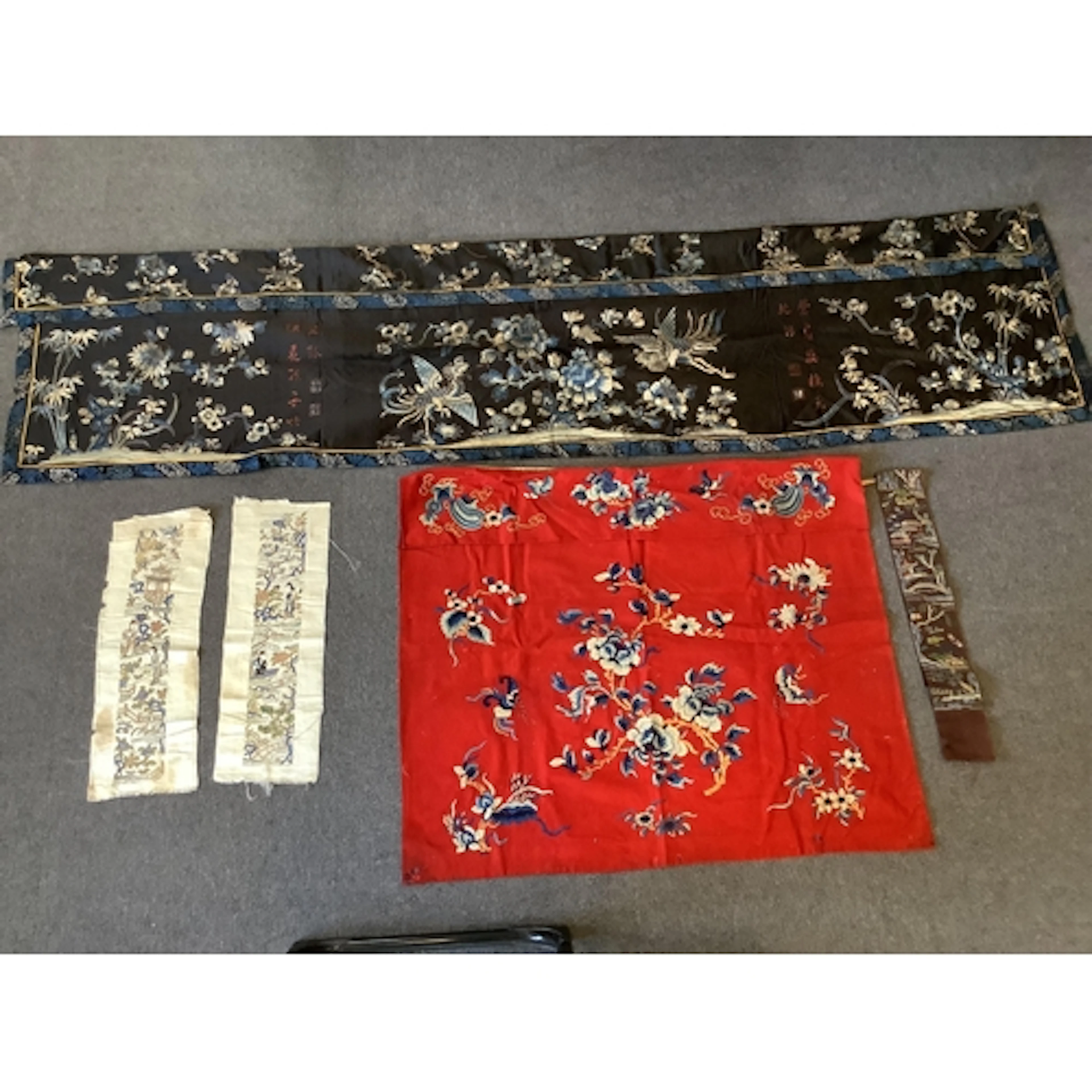 A late Qing Dynasty Chinese embroidered hanging with auspici...