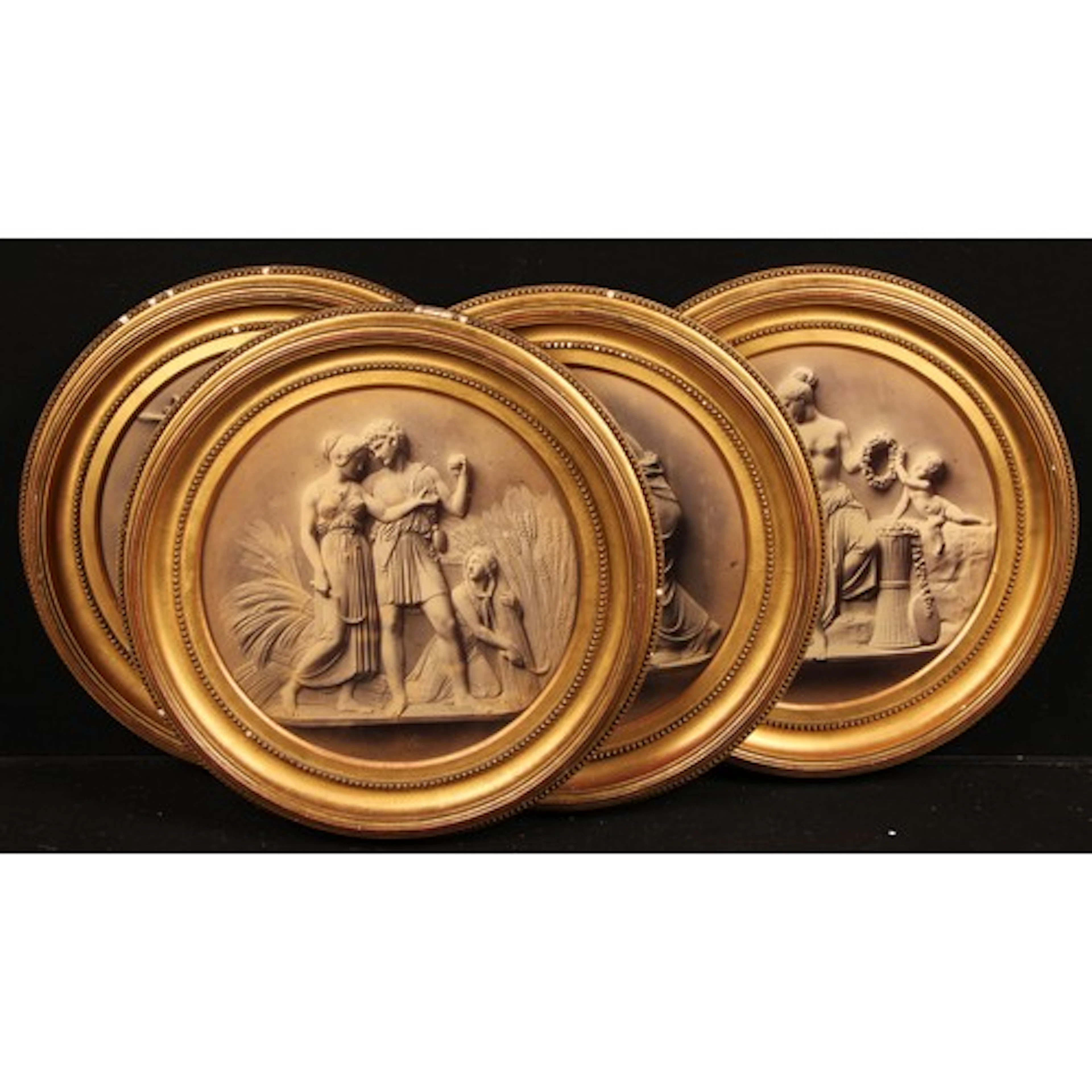 A set of four 19th century circular photographic prints, The...