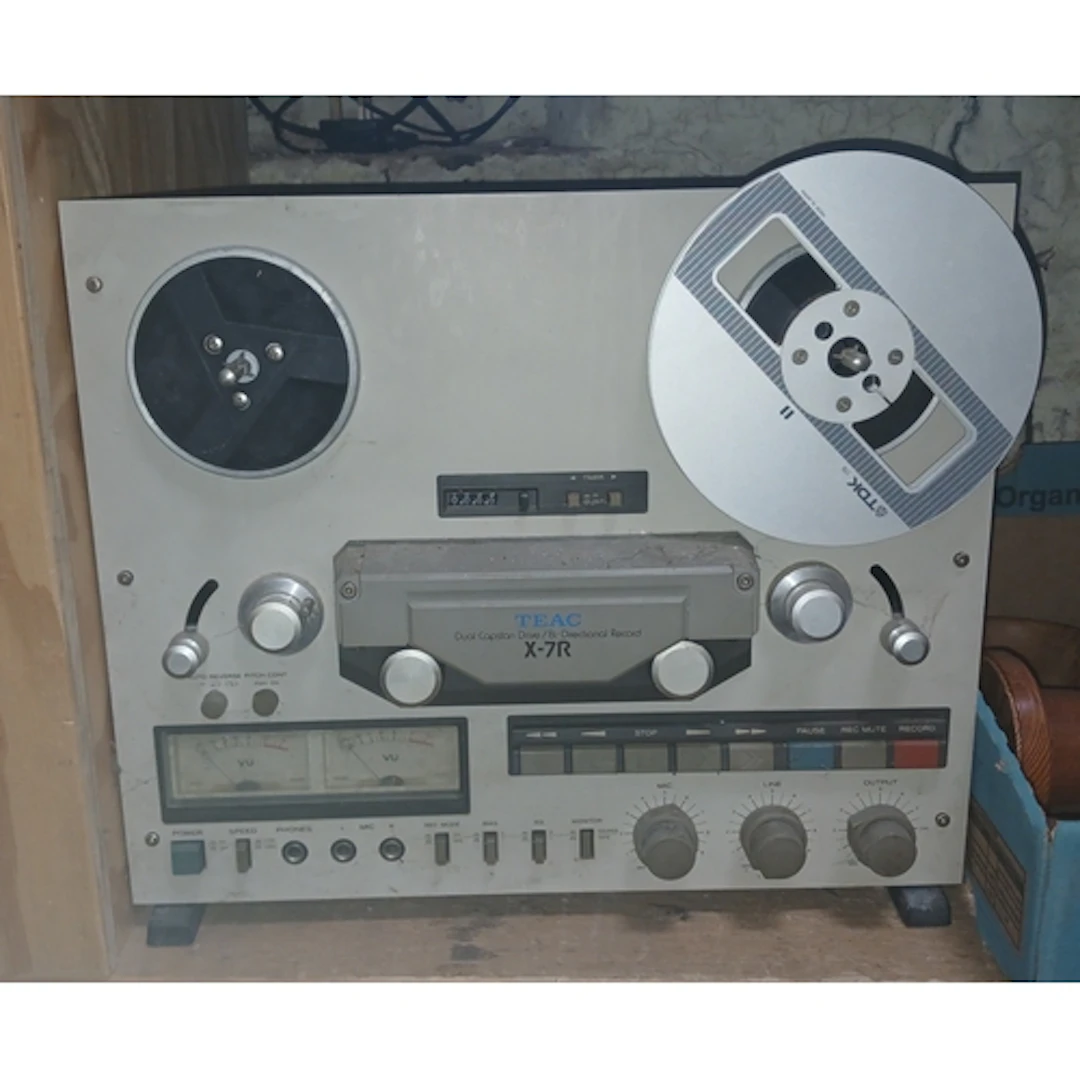A Teac X-7R reel to reel player/recorder.