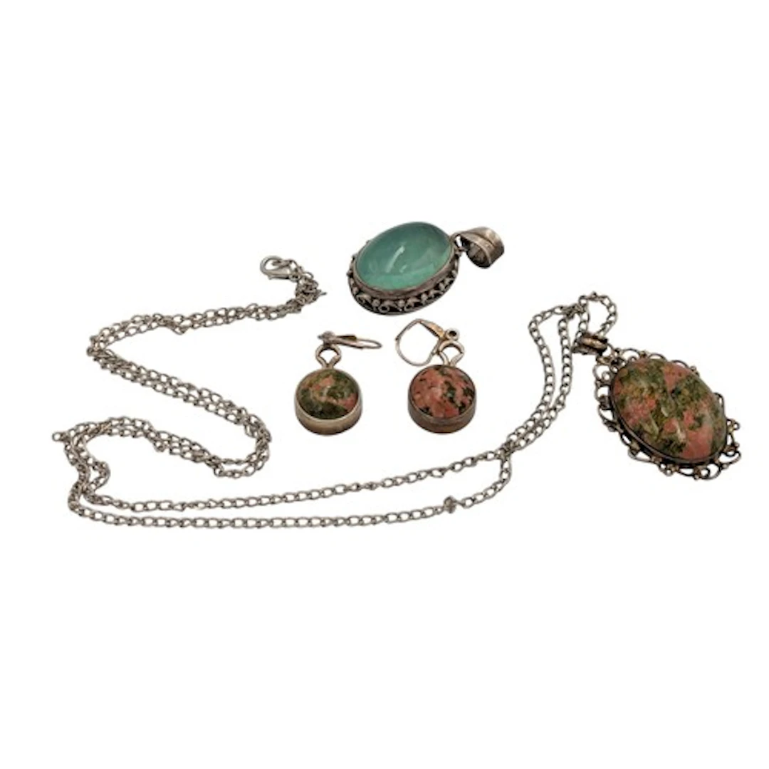 A pair of silver stone set earrings, matching pendant; anoth...