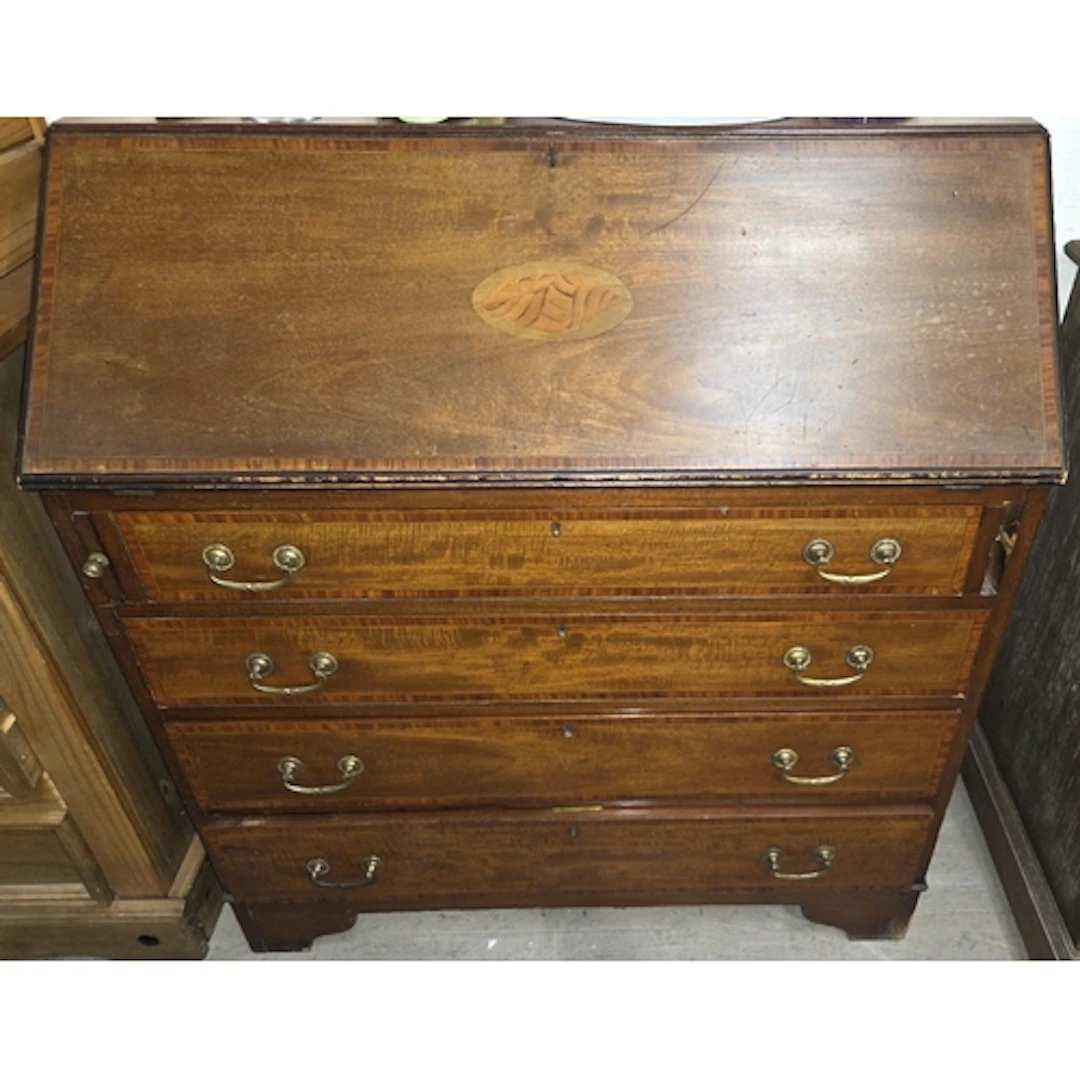 An Edwardian Sheraton revival style mahogany bureau, crossba...