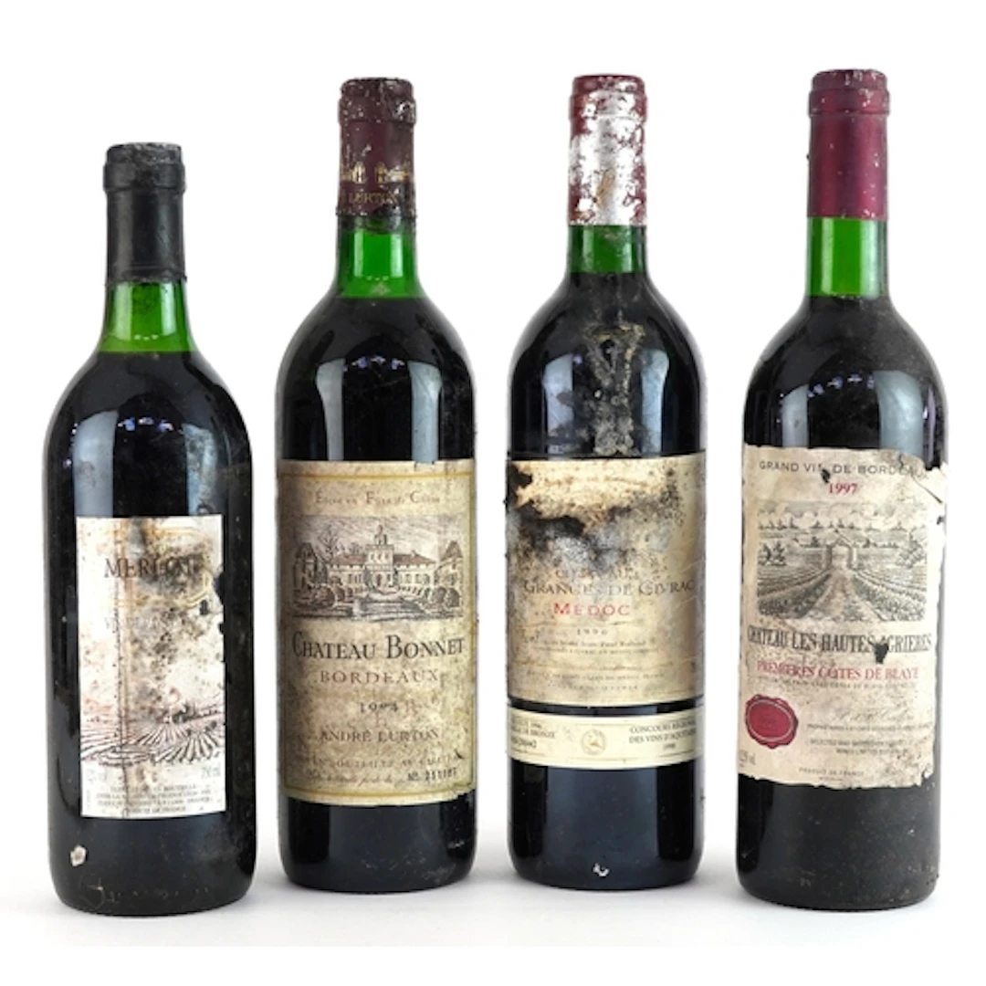 Four bottles of red wine including Château les Granges de Ci...
