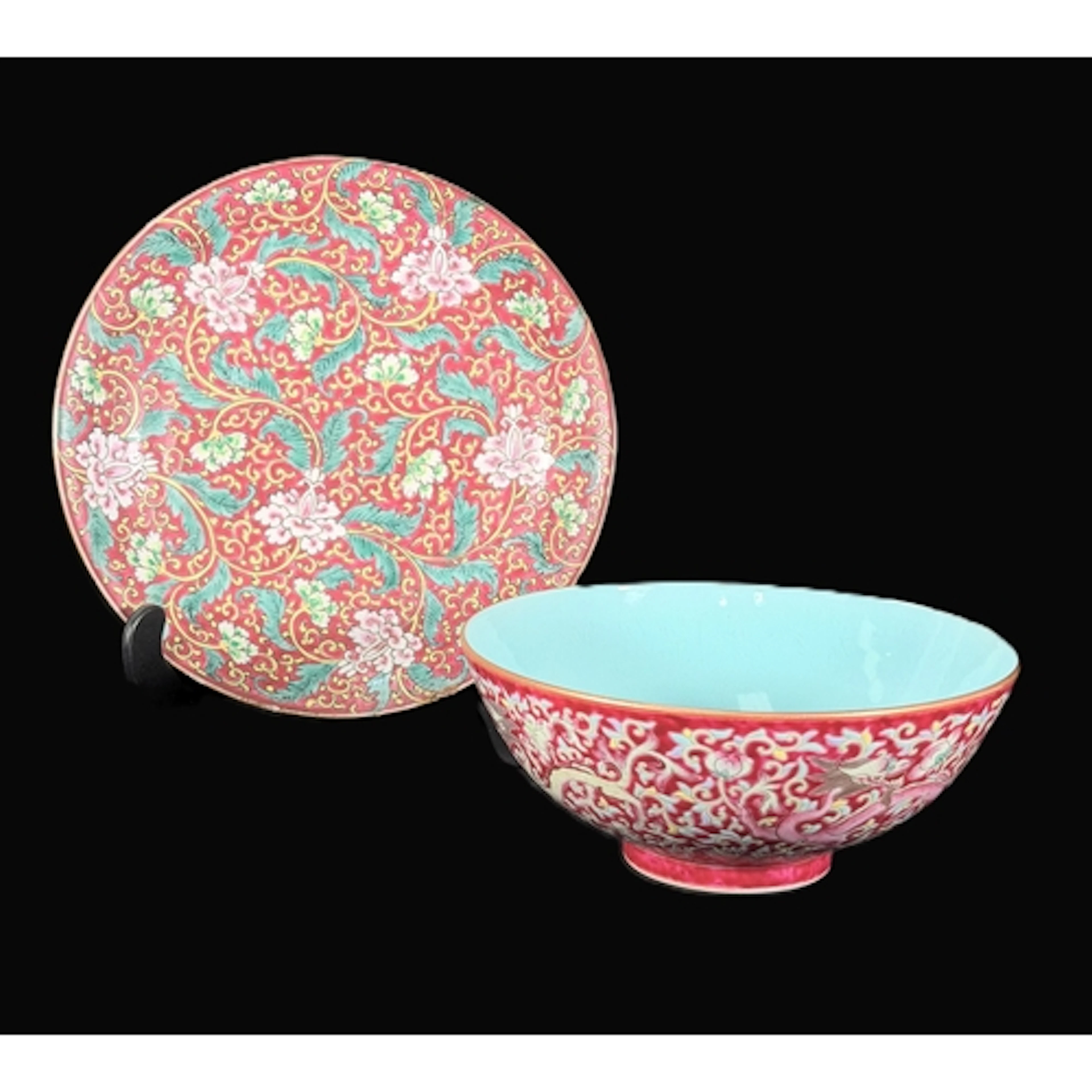A Chinese porcelain famille rose bowl, deep pink ground intr...