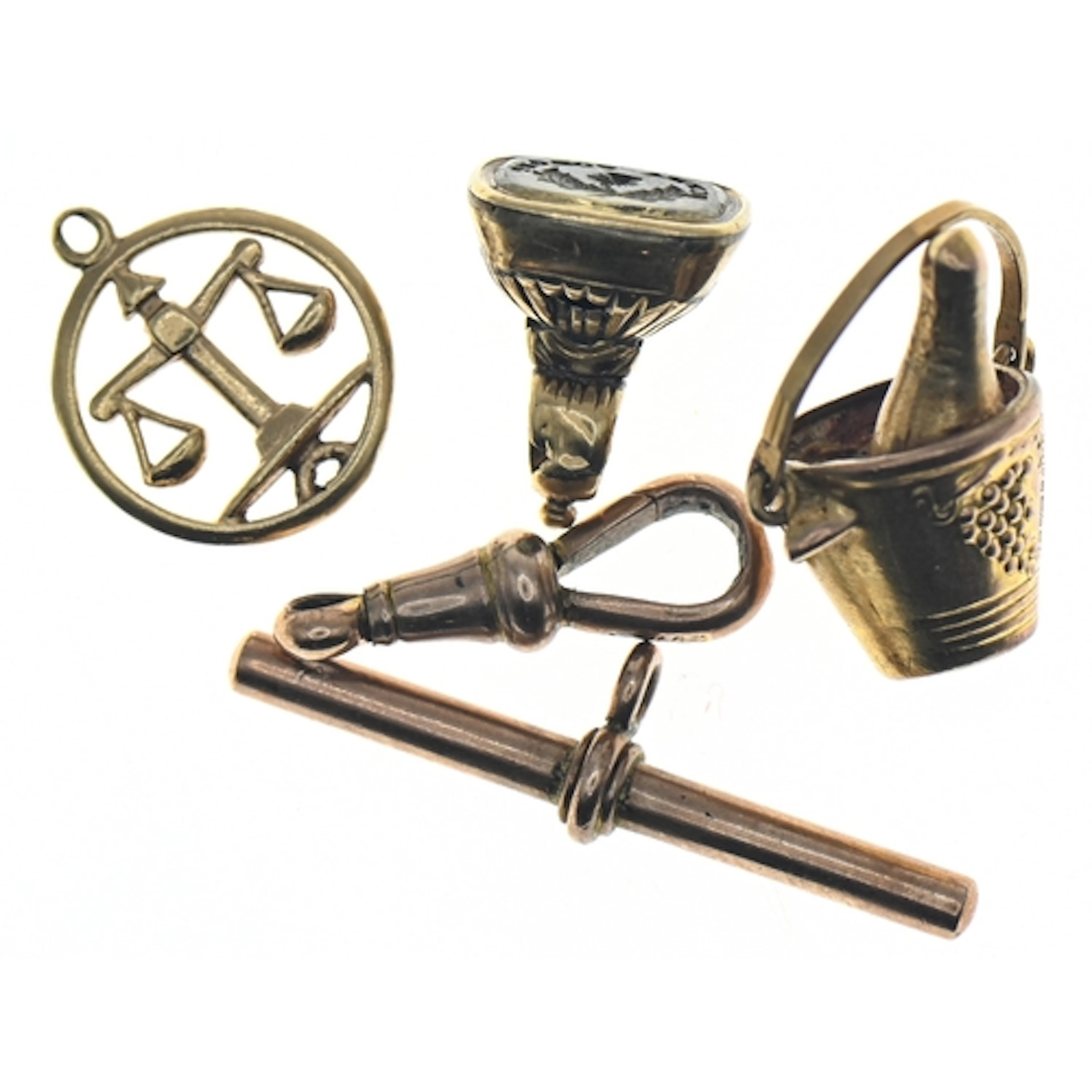 9ct gold T-bar, clasp and champagne bucket charm, a yellow m...