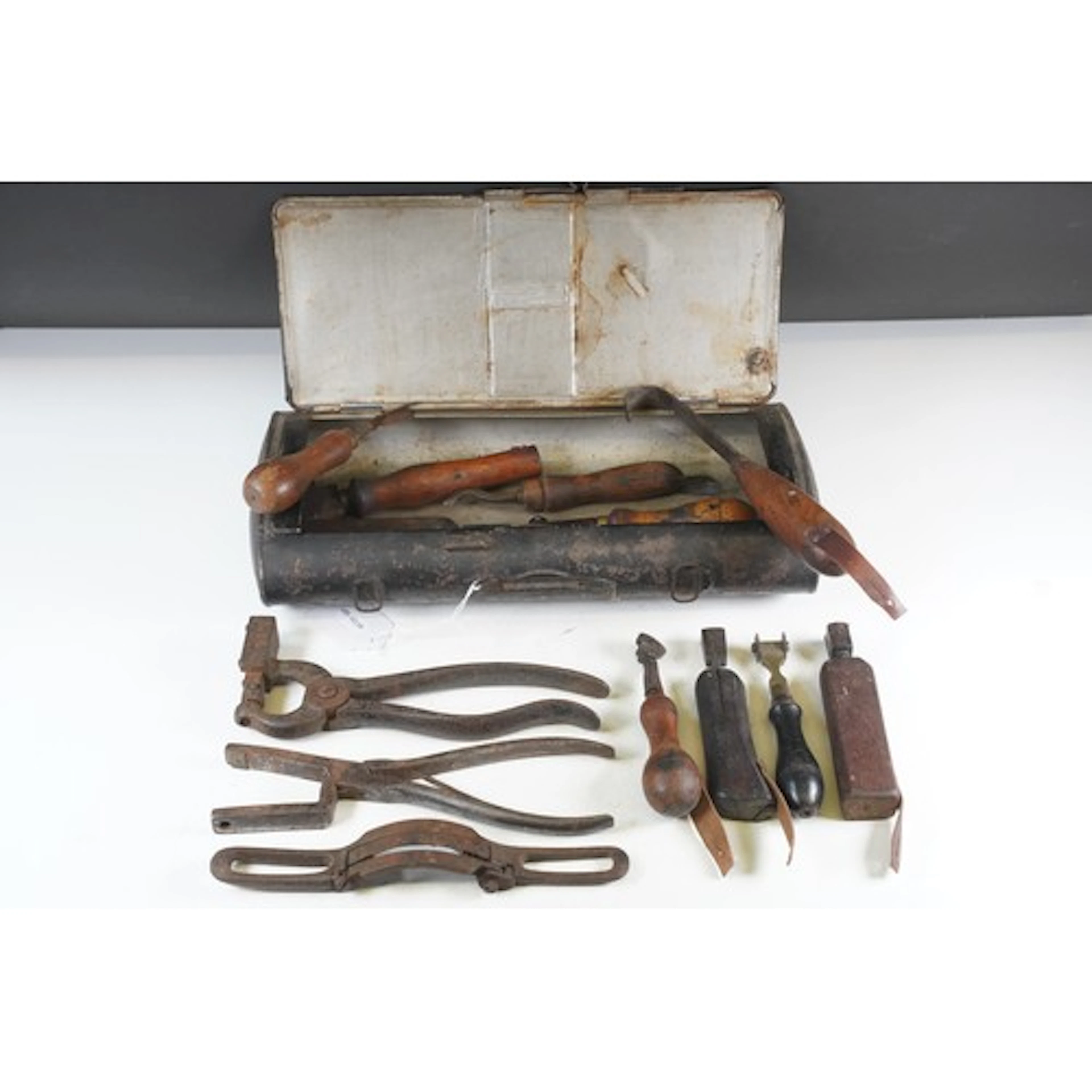 Collection of antique cobblers' tools, to comprise pricking ...